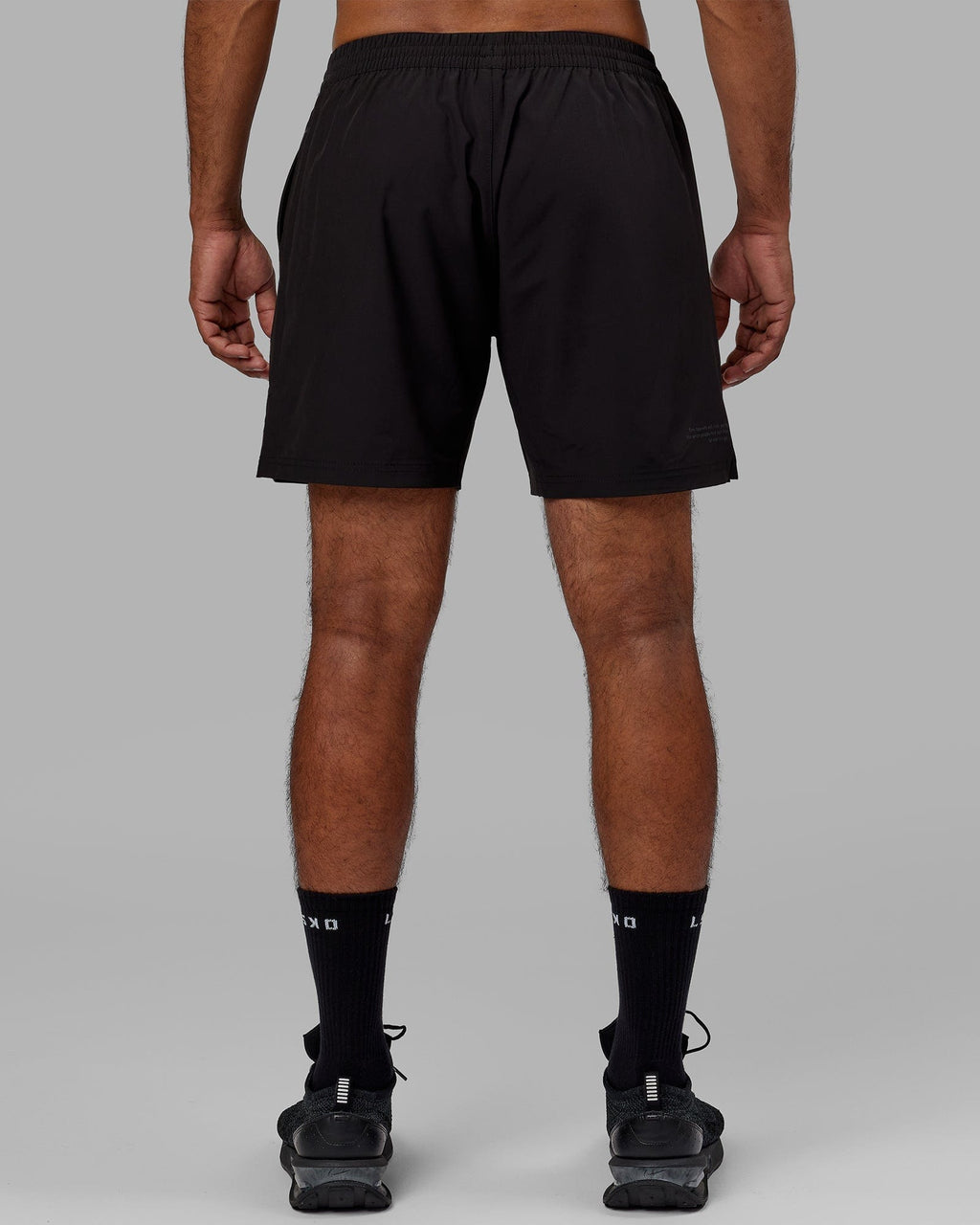 Model wearing Intensity 7" Performance Short - Black