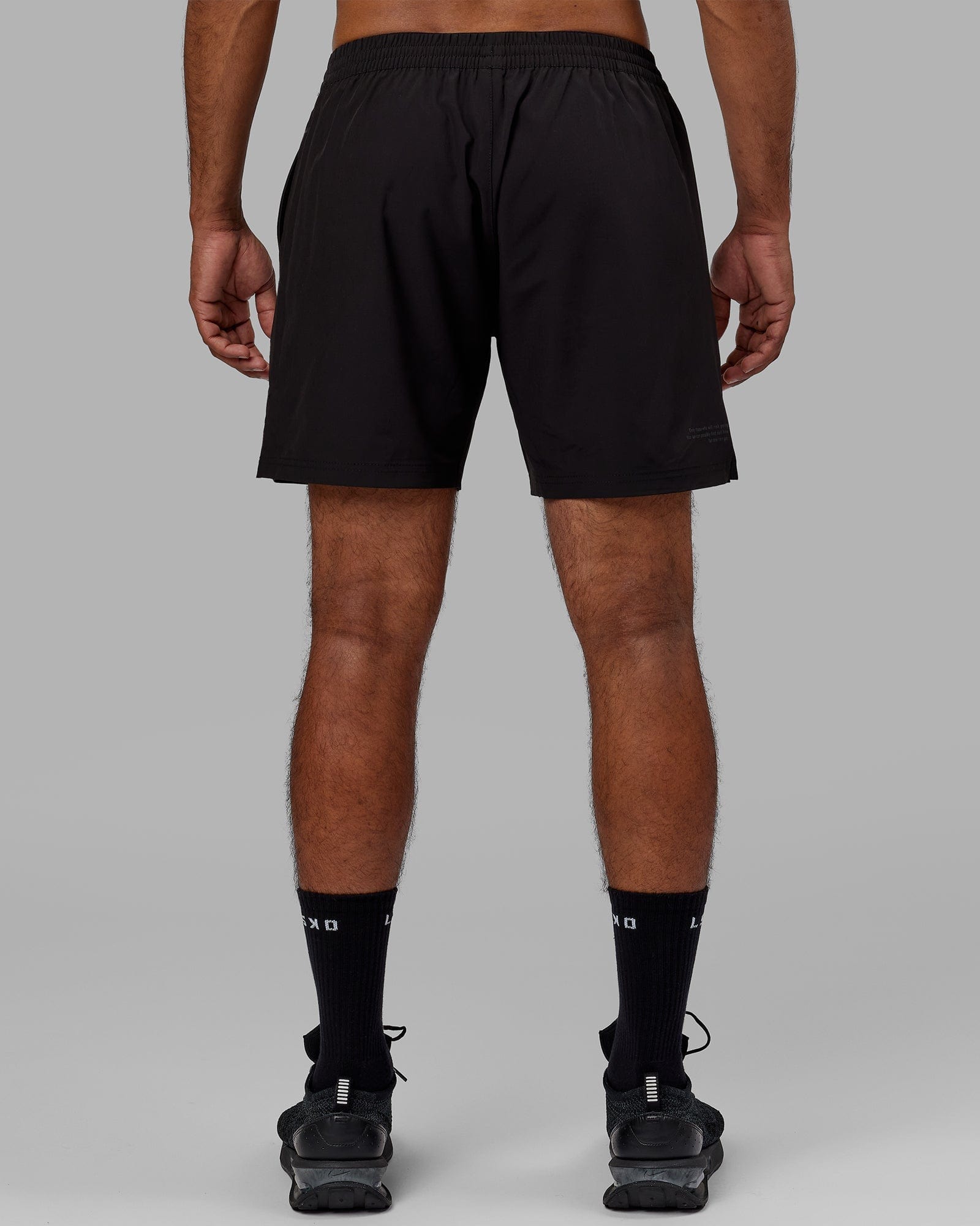 Model wearing Intensity 7" Performance Short - Black