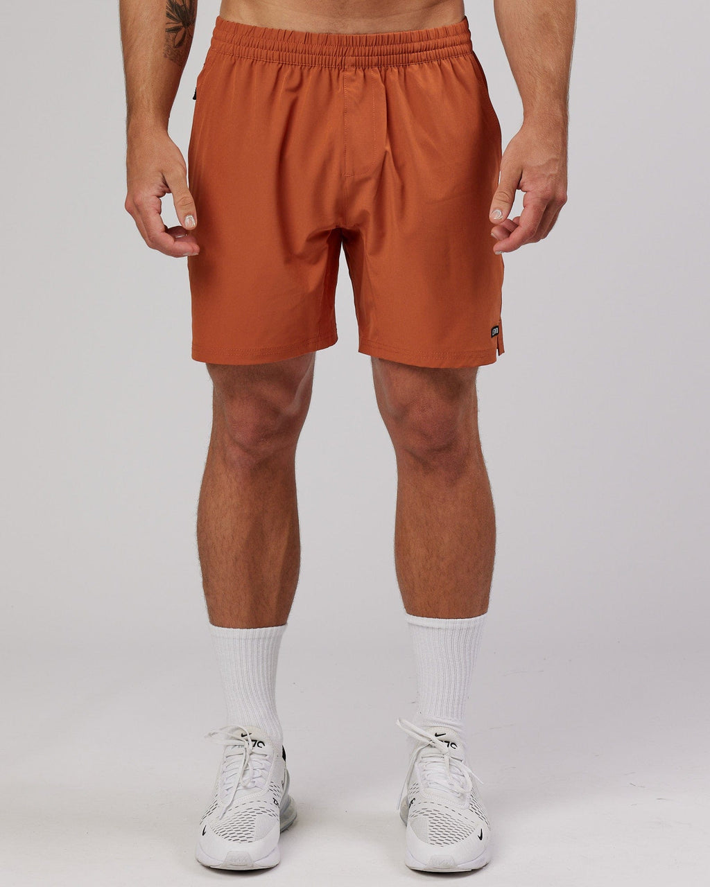 Model wearing Intensity 7'' Performance Short - Auburn