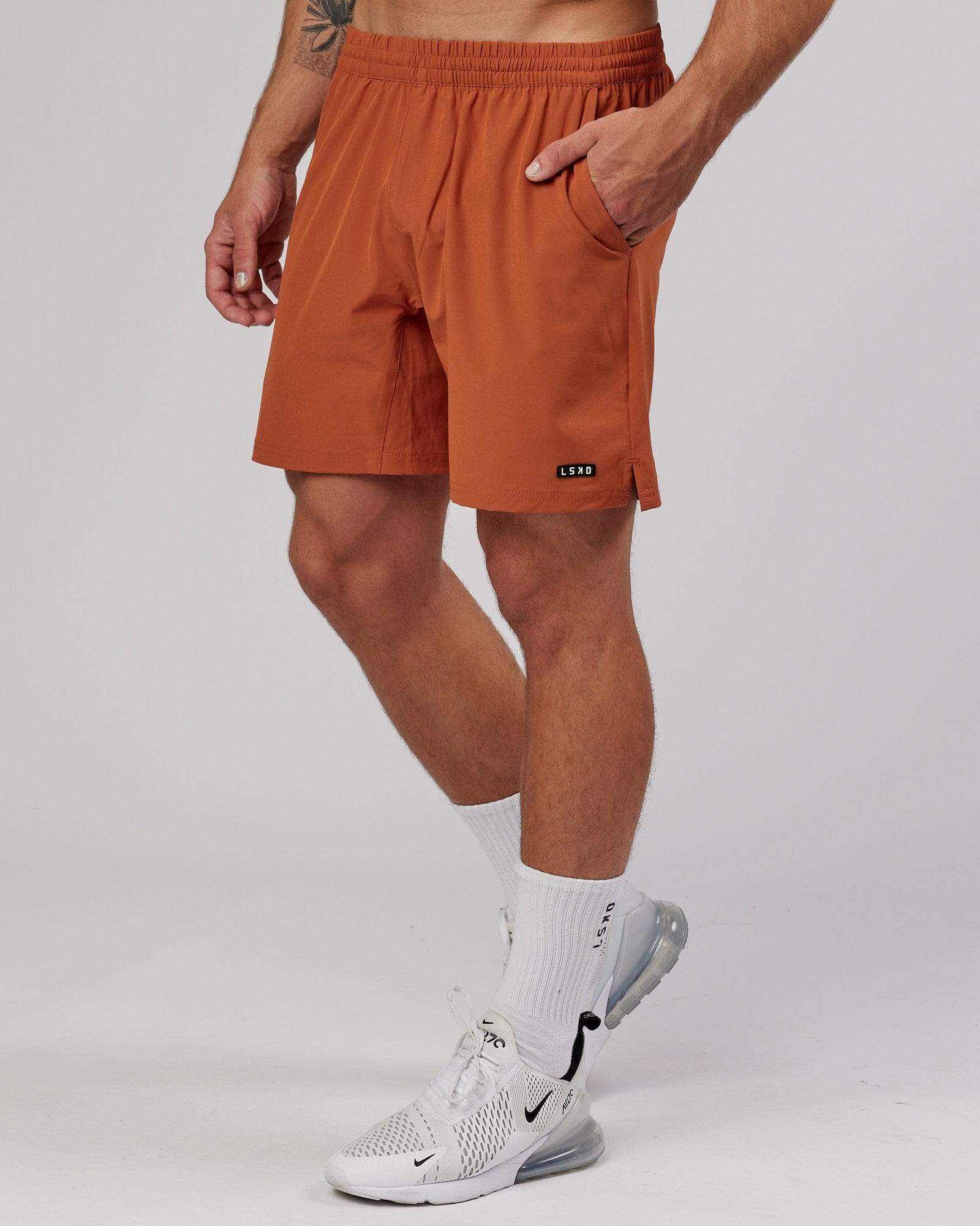 Model wearing Intensity 7'' Performance Short - Auburn