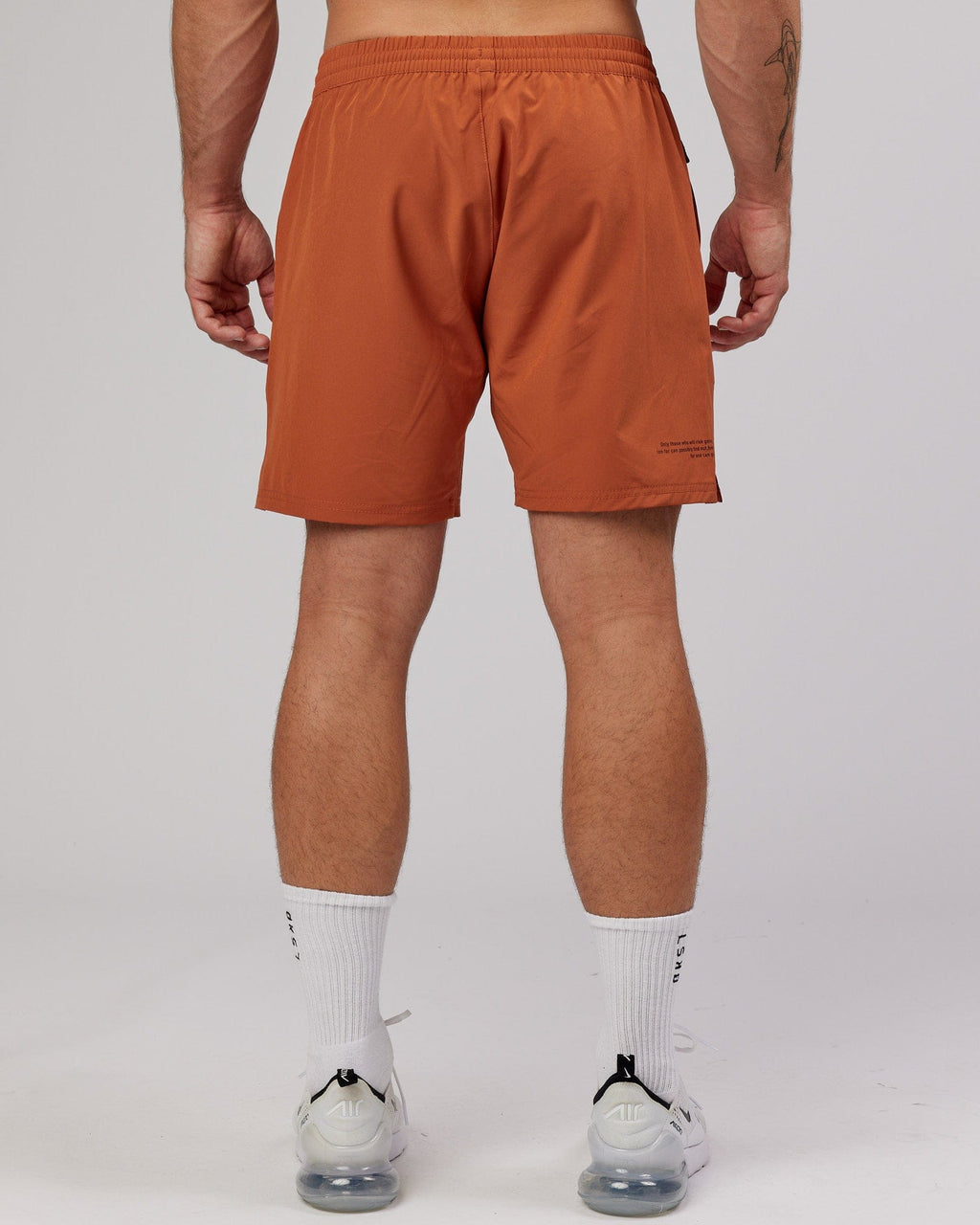 Model wearing Intensity 7'' Performance Short - Auburn