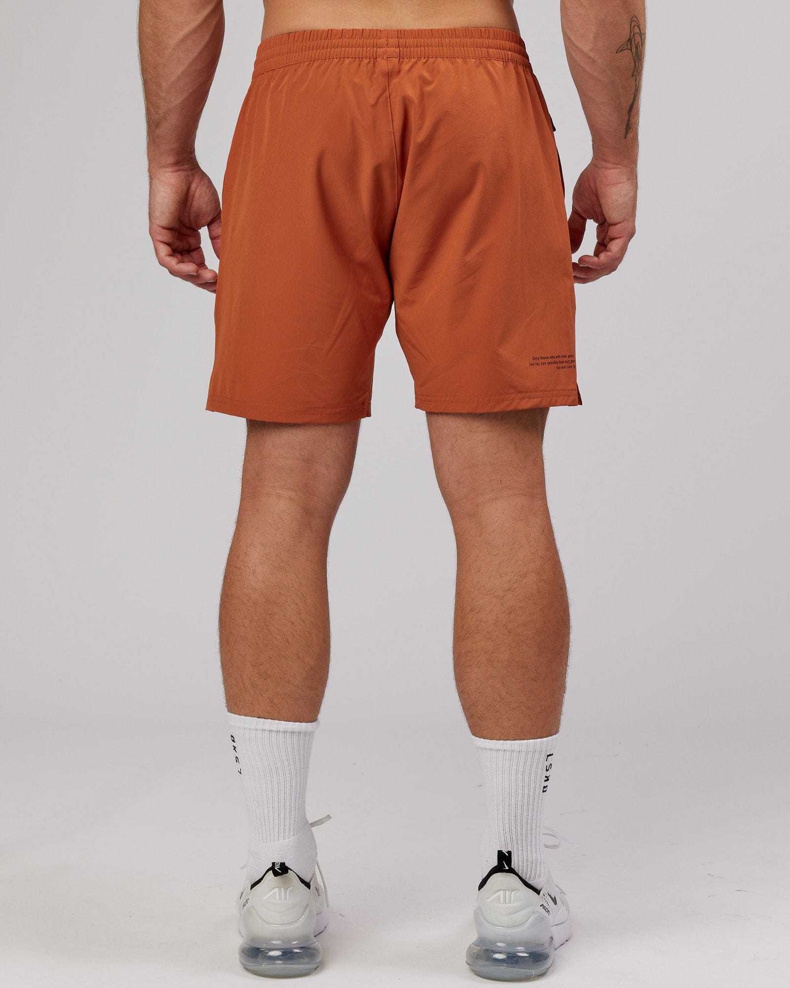 Model wearing Intensity 7'' Performance Short - Auburn