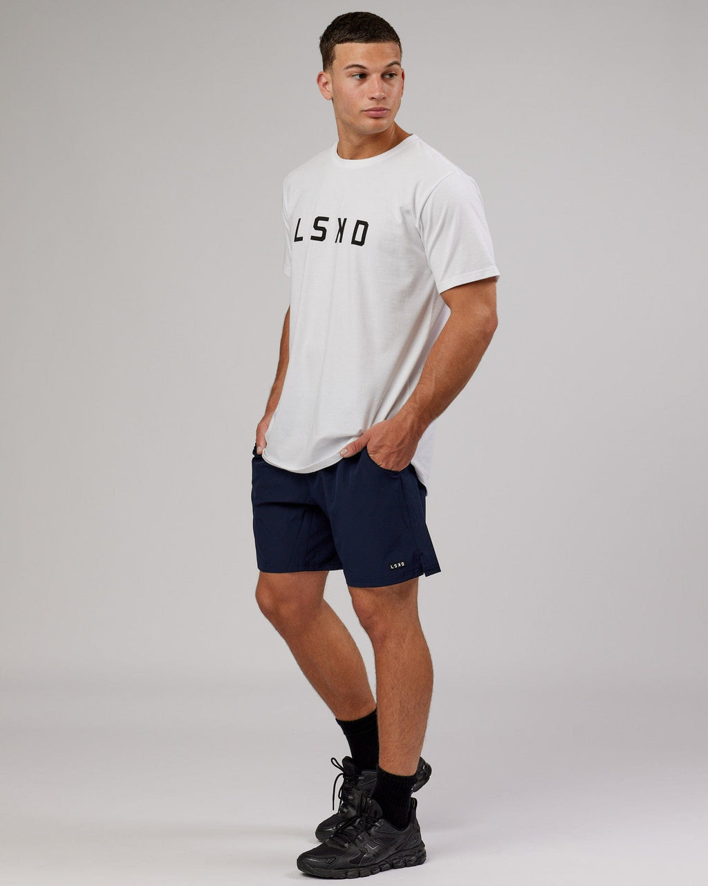 Model wearing Intensity 7'' Performance Short - Navy