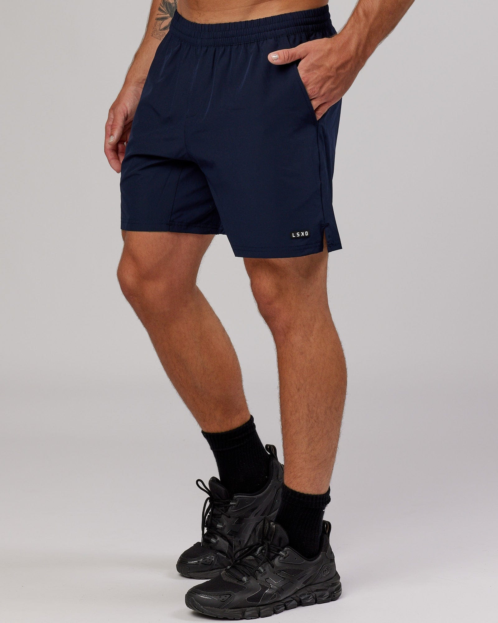 Model wearing Intensity 7'' Performance Short - Navy