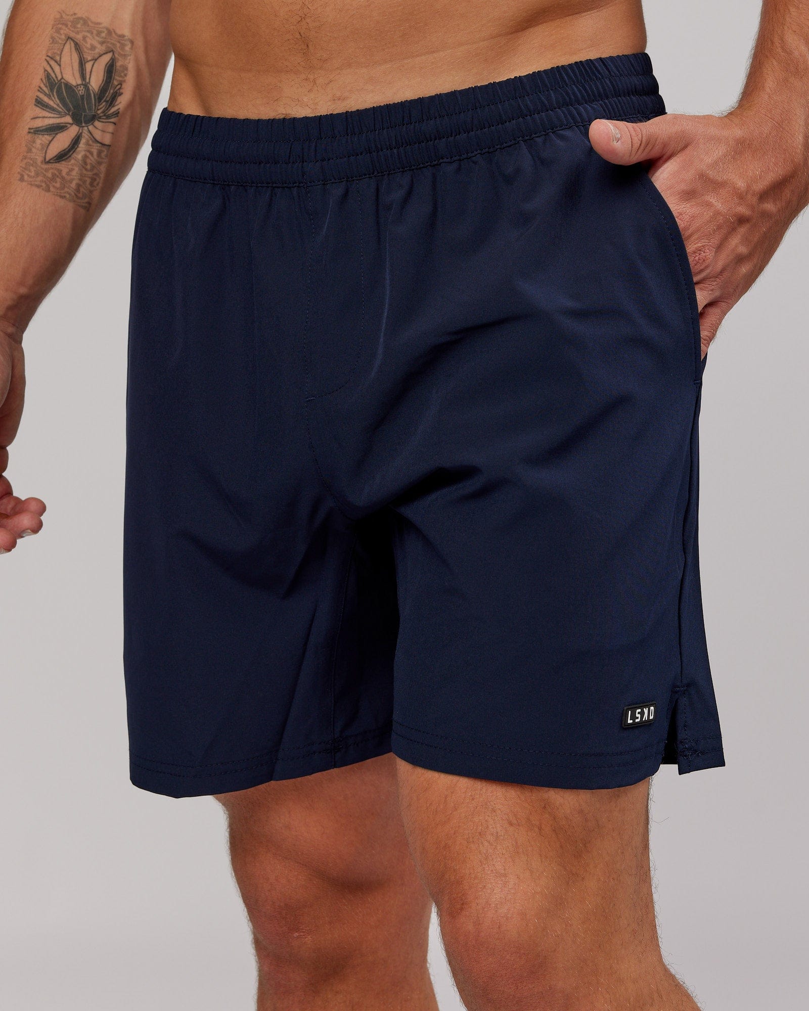 Model wearing Intensity 7'' Performance Short - Navy