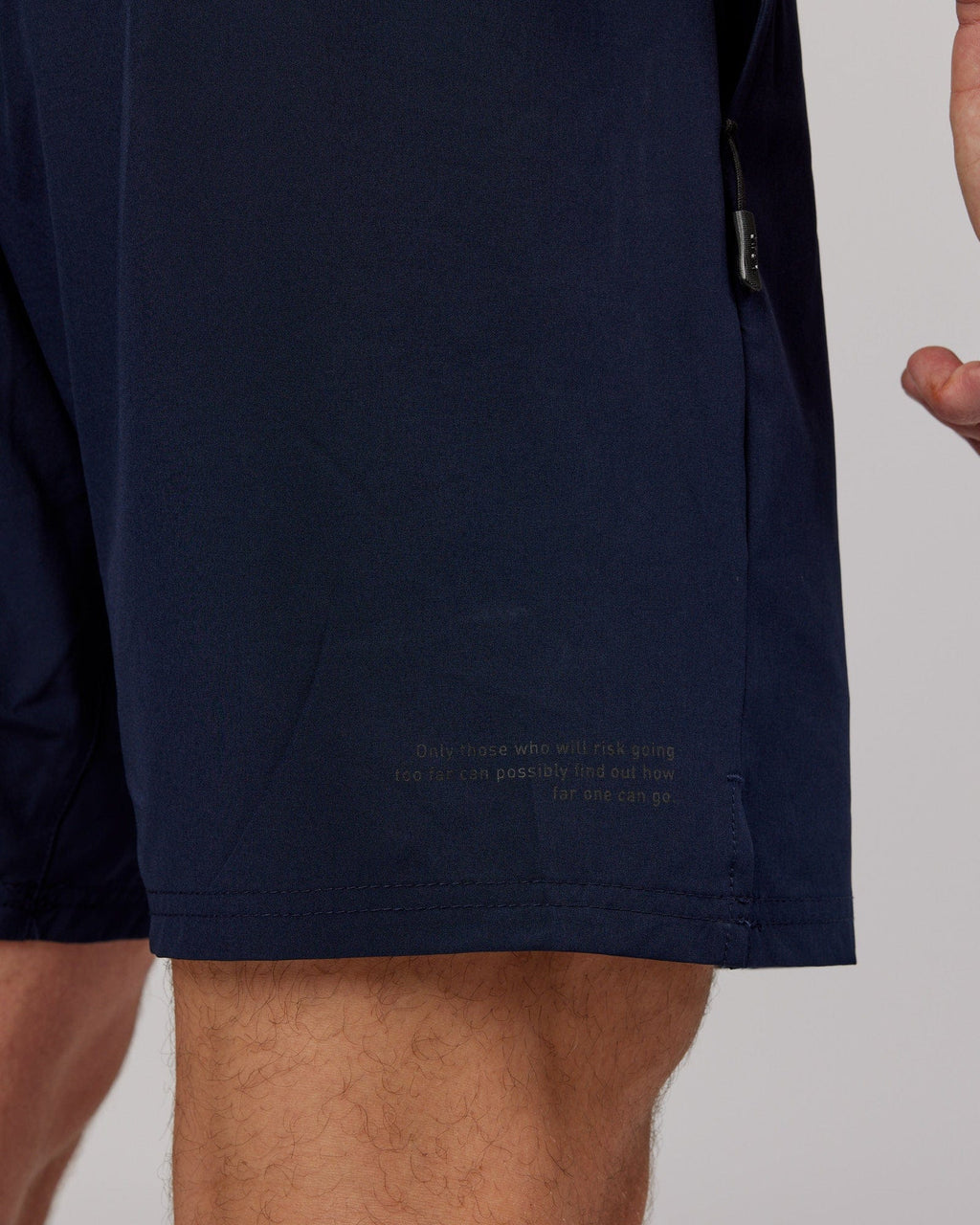 Model wearing Intensity 7'' Performance Short - Navy