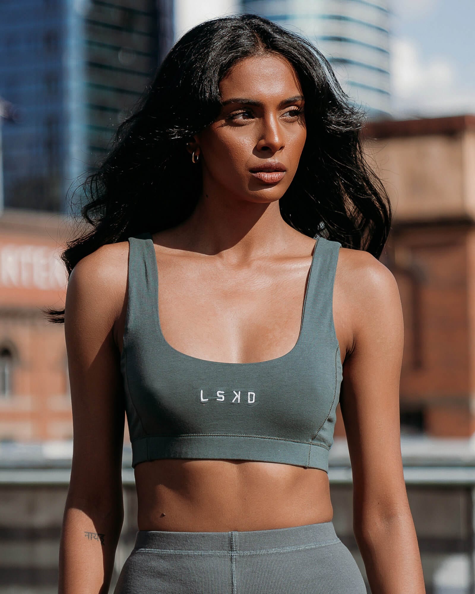 Model wearing Willow Lounge Bra - Carbon Green