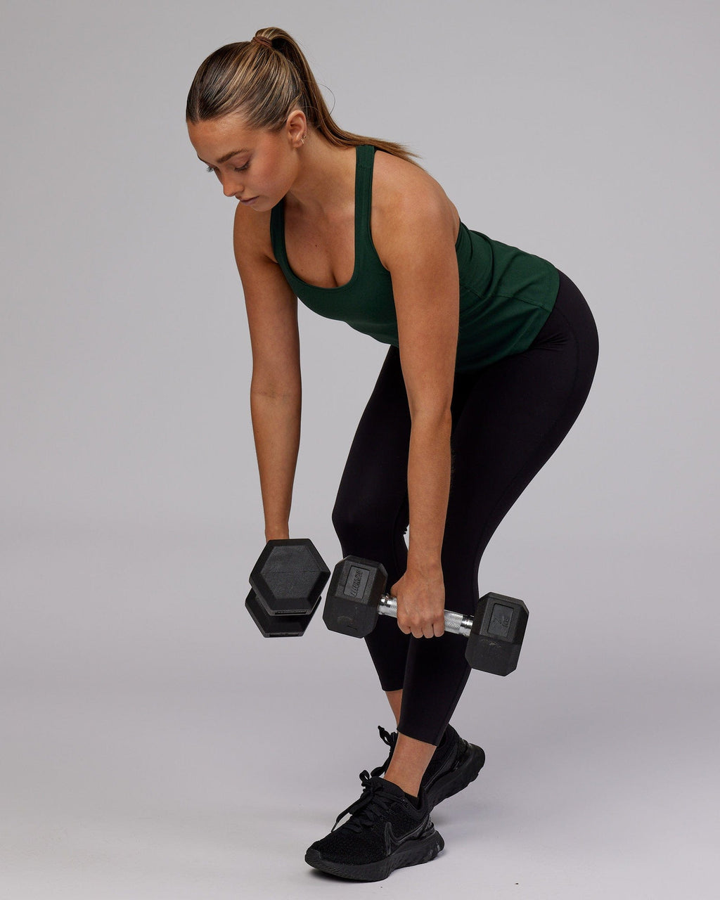 Model wearing Lift Performance Tank - Vital Green