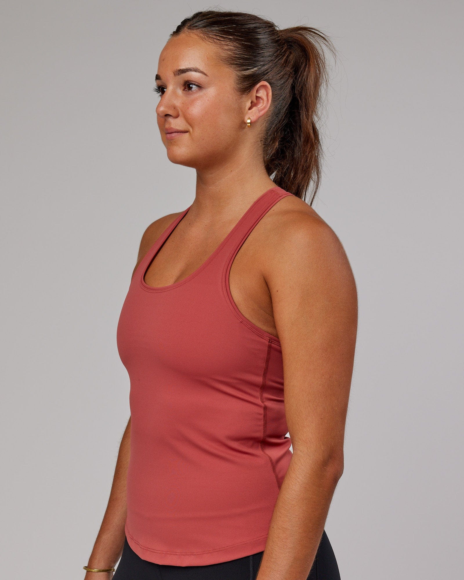 Model wearing Lift Shelf Bra Performance Tank - Marsala