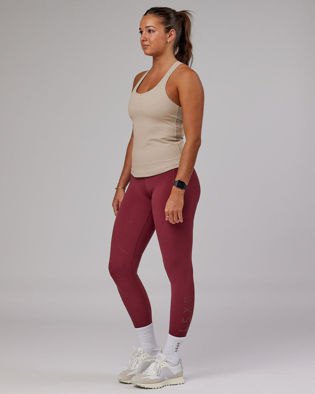 Model wearing Lift Shelf Bra Performance Tank - Silver Grey