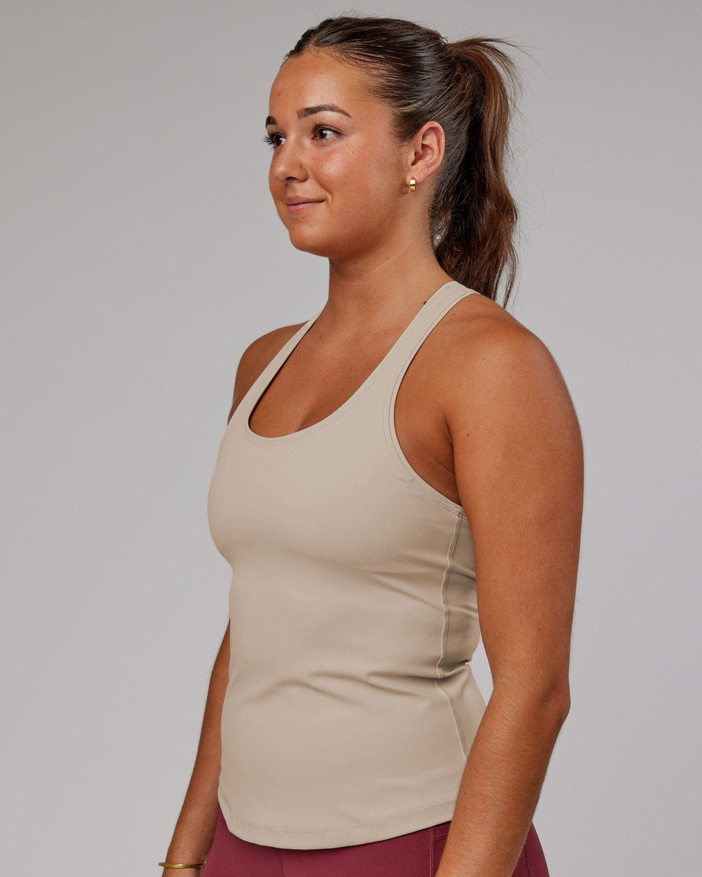 Model wearing Lift Shelf Bra Performance Tank - Silver Grey