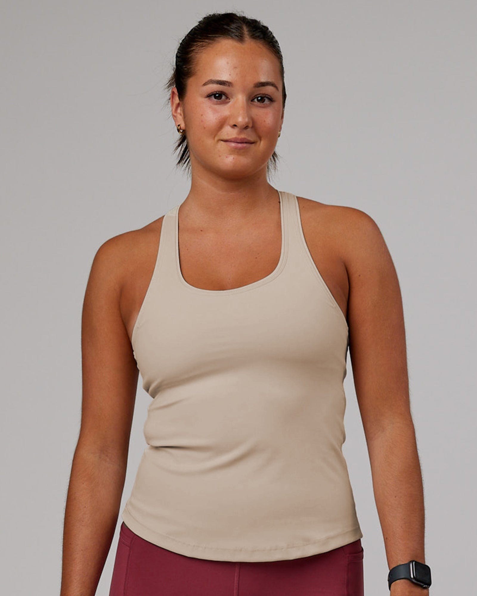Model wearing Lift Shelf Bra Performance Tank - Silver Grey