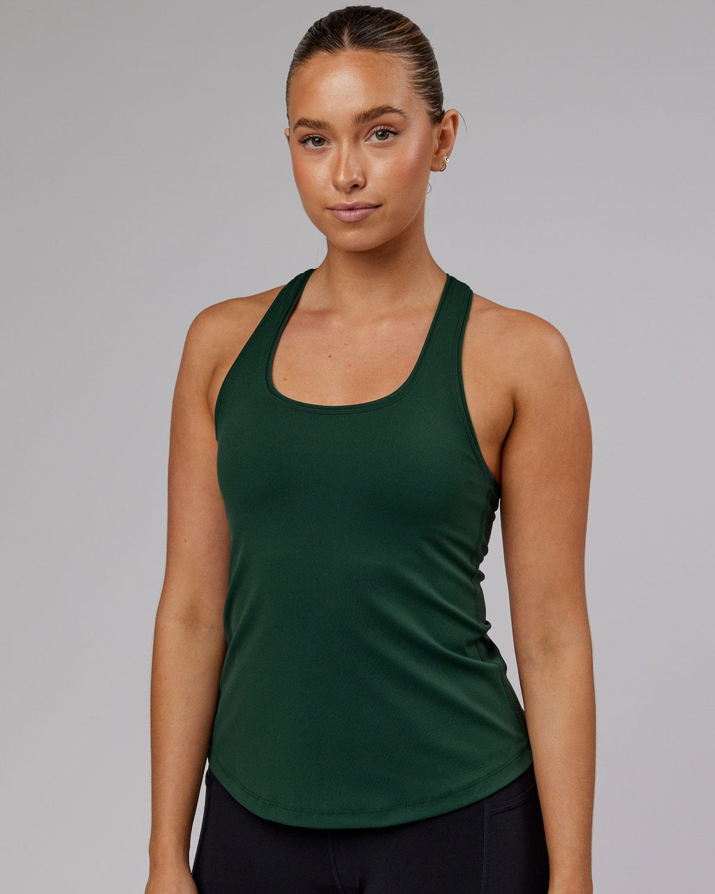 Model wearing Lift Shelf Bra Performance Tank - Vital Green