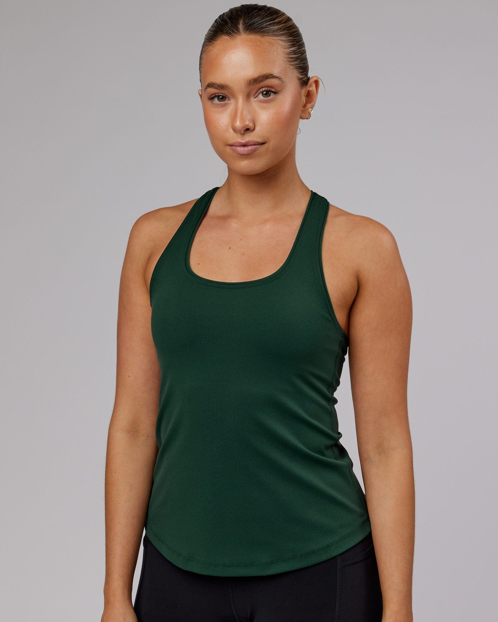 Model wearing Lift Shelf Bra Performance Tank - Vital Green