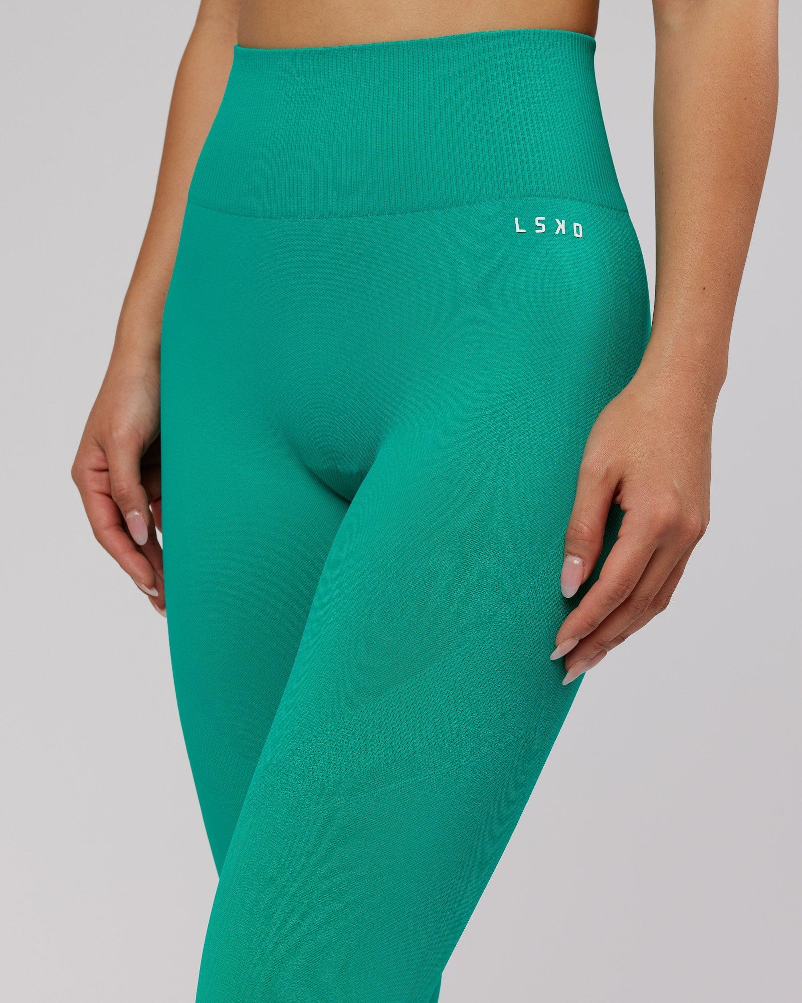 Model wearing Limitless Seamless Full Length Tight - Hyper Teal