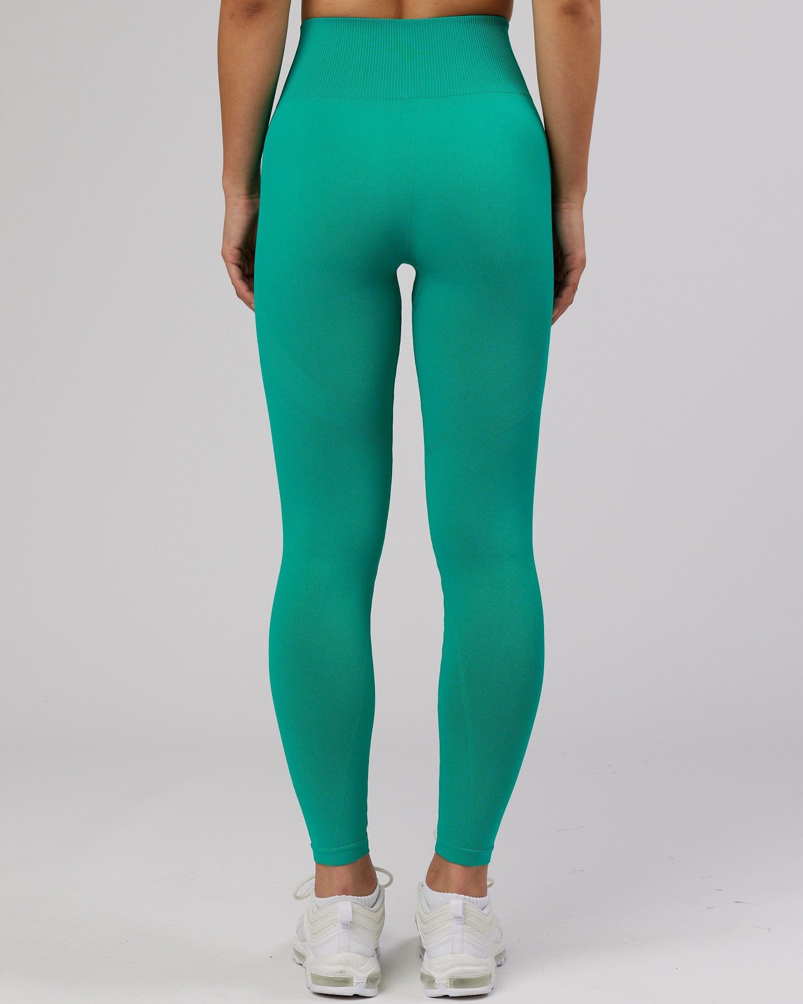 Model wearing Limitless Seamless Full Length Tight - Hyper Teal