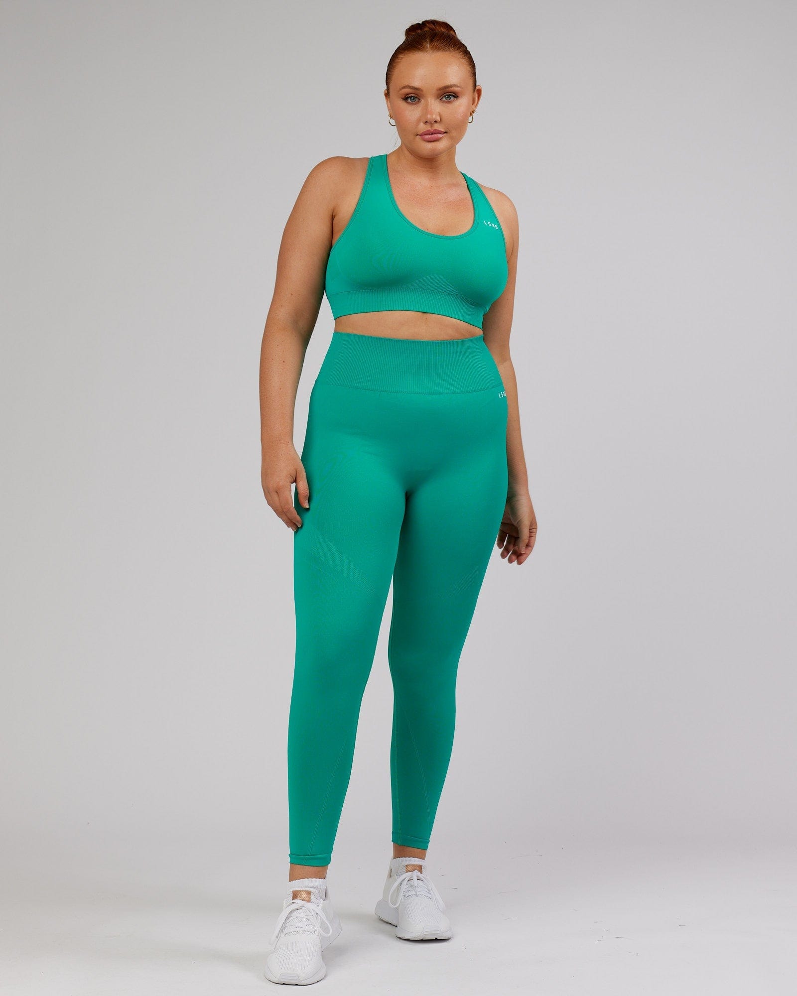 Model wearing Limitless Seamless Full Length Tight - Hyper Teal