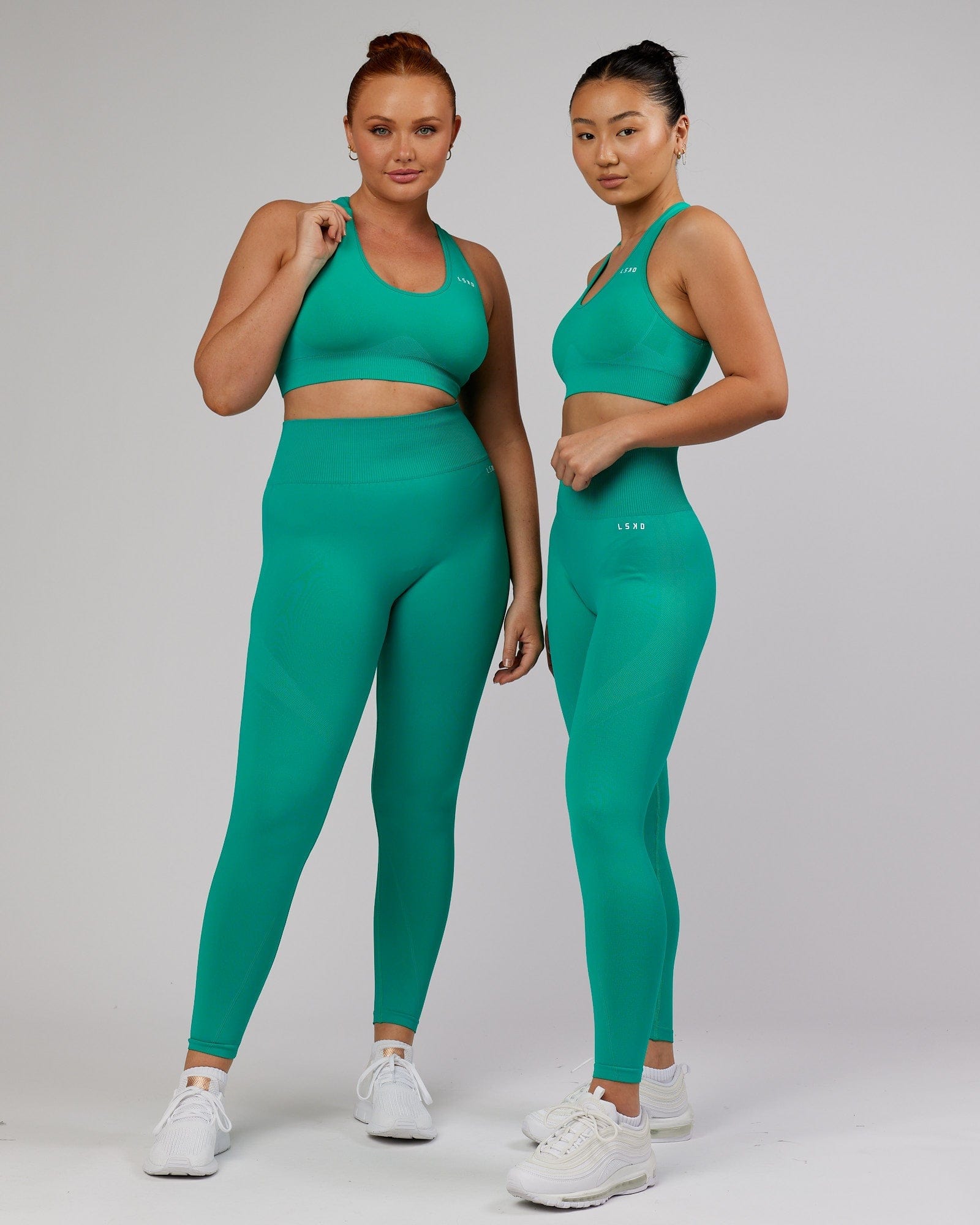 Model wearing Limitless Seamless Full Length Tight - Hyper Teal