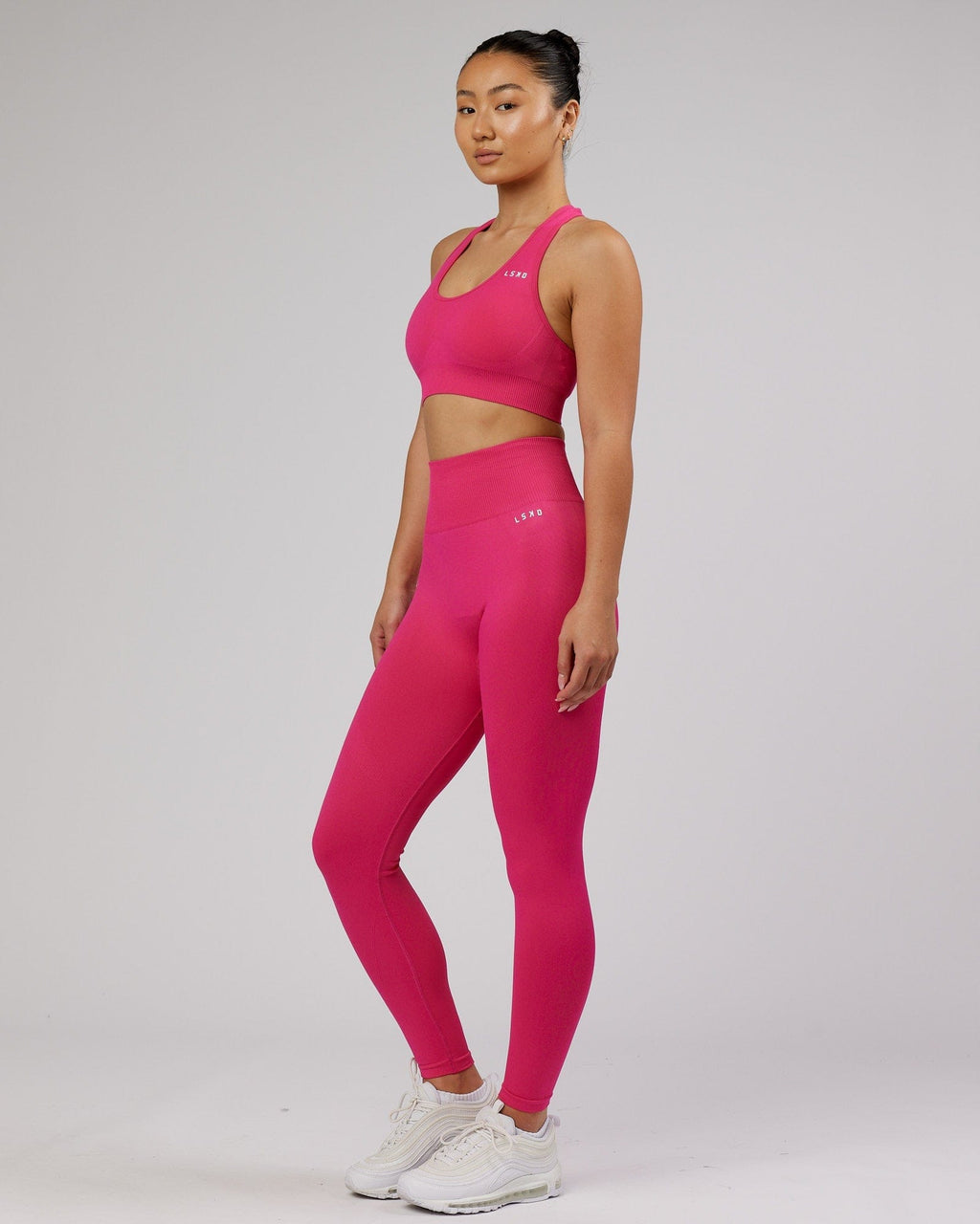Model wearing Limitless Seamless Full Length Tight - Magenta