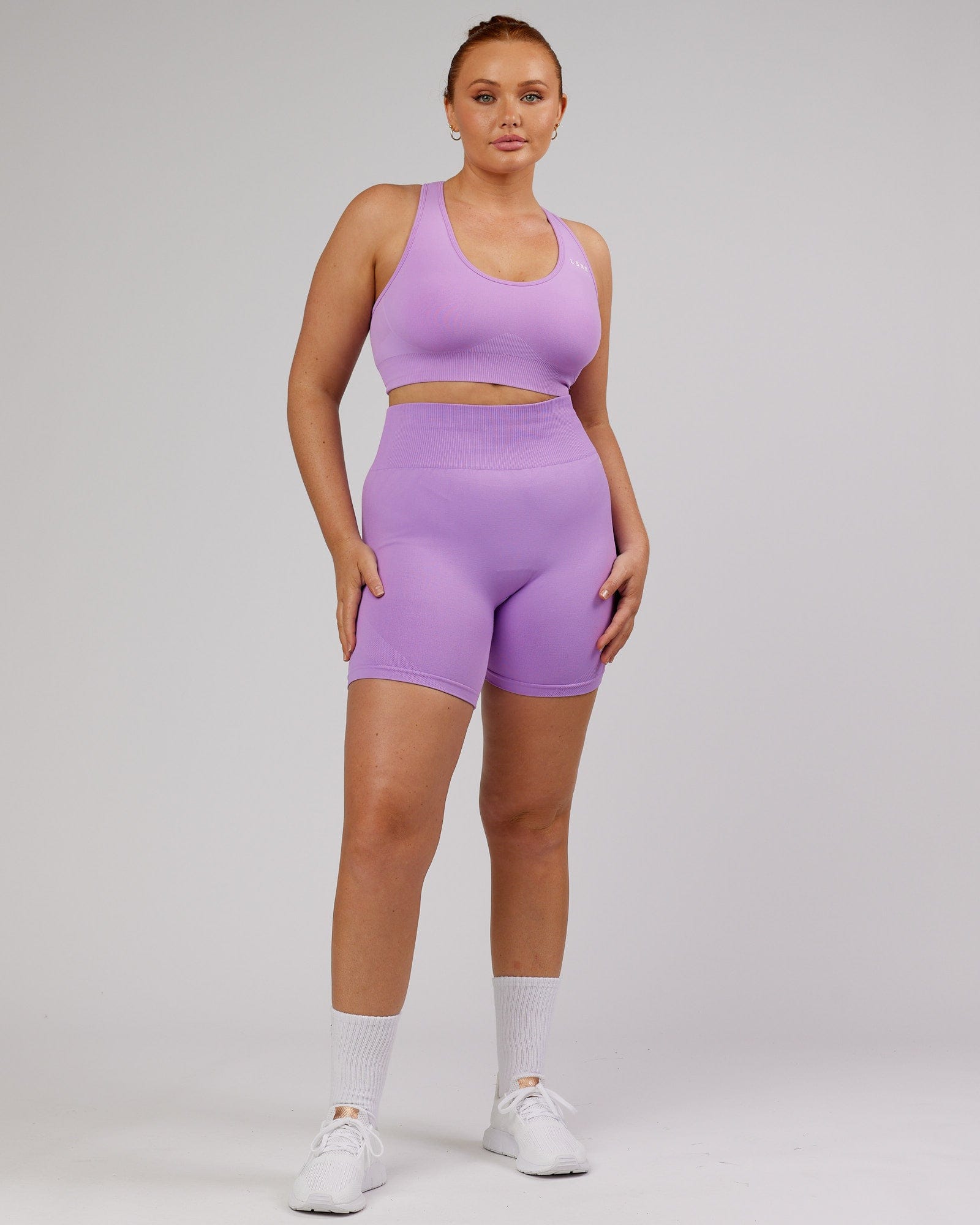 Model wearing Limitless Seamless Mid Short - Lilac