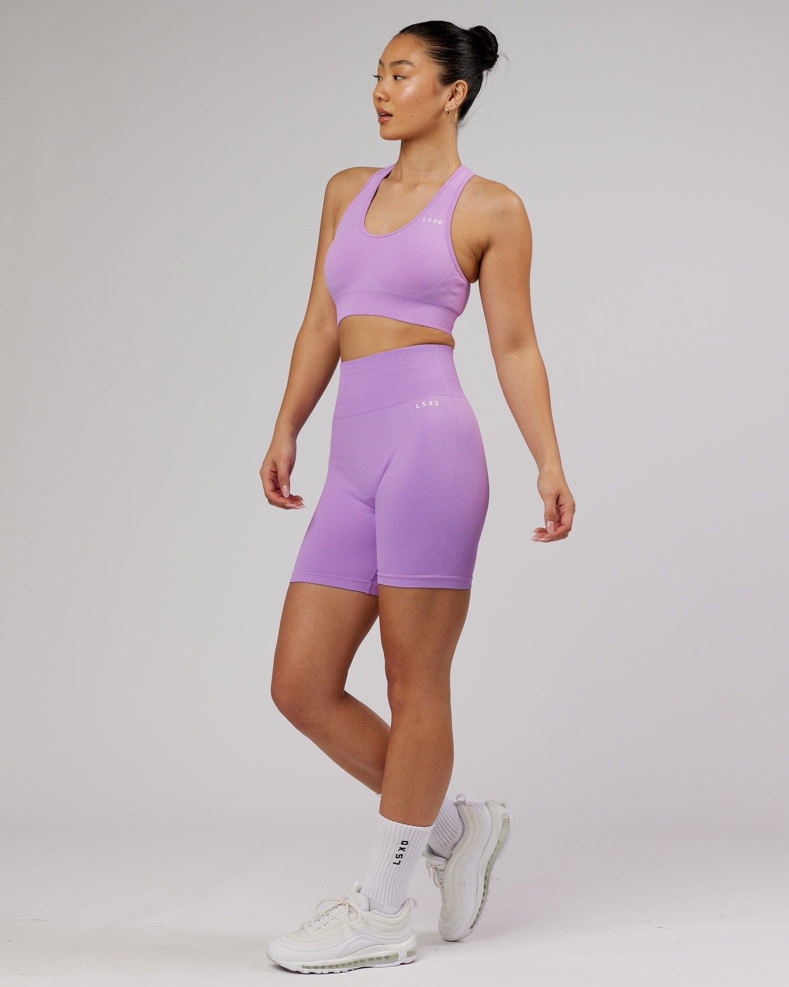 Model wearing Limitless Seamless Mid Short - Lilac