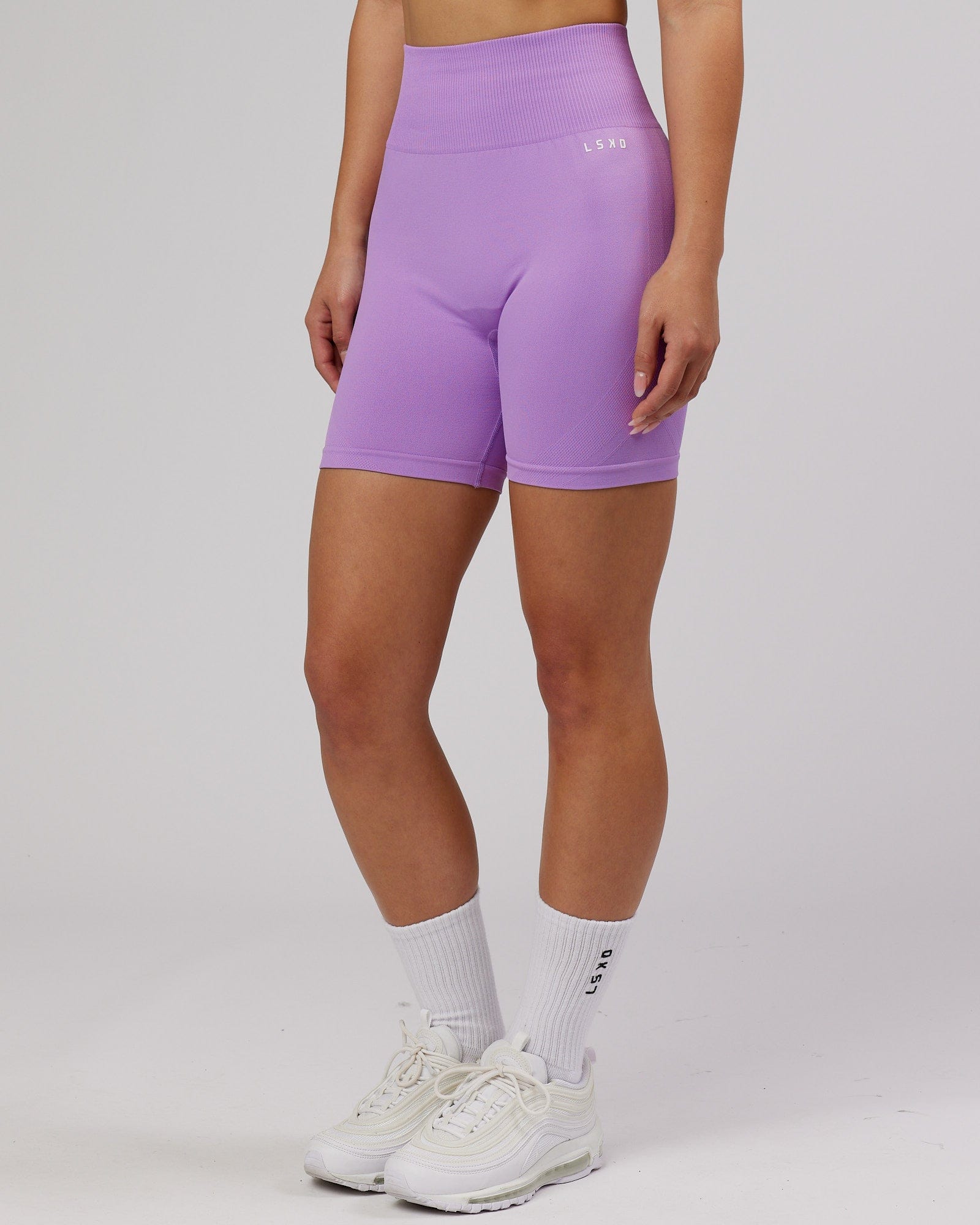 Model wearing Limitless Seamless Mid Short - Lilac