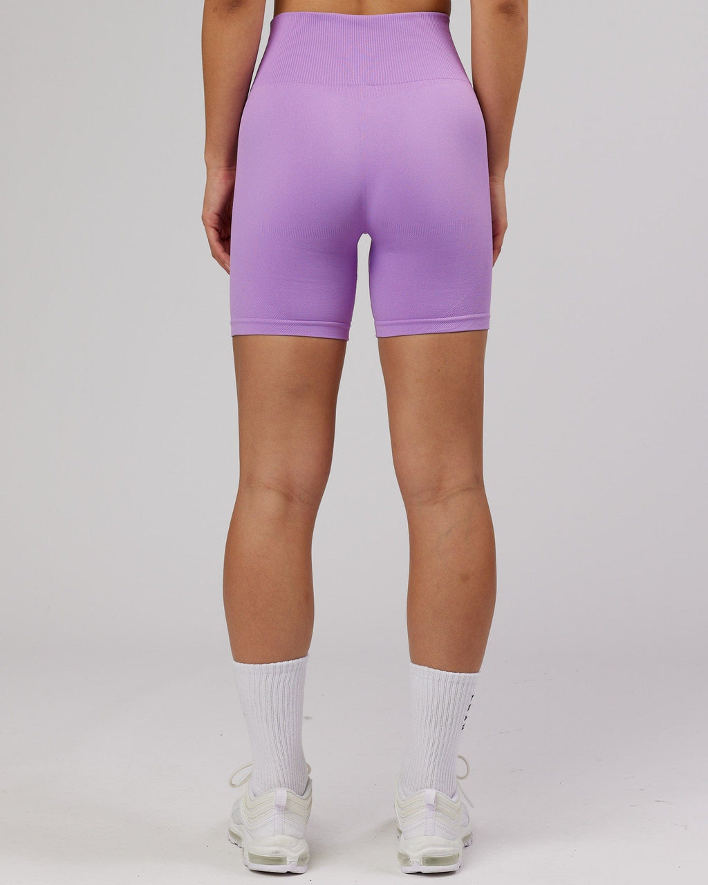 Model wearing Limitless Seamless Mid Short - Lilac
