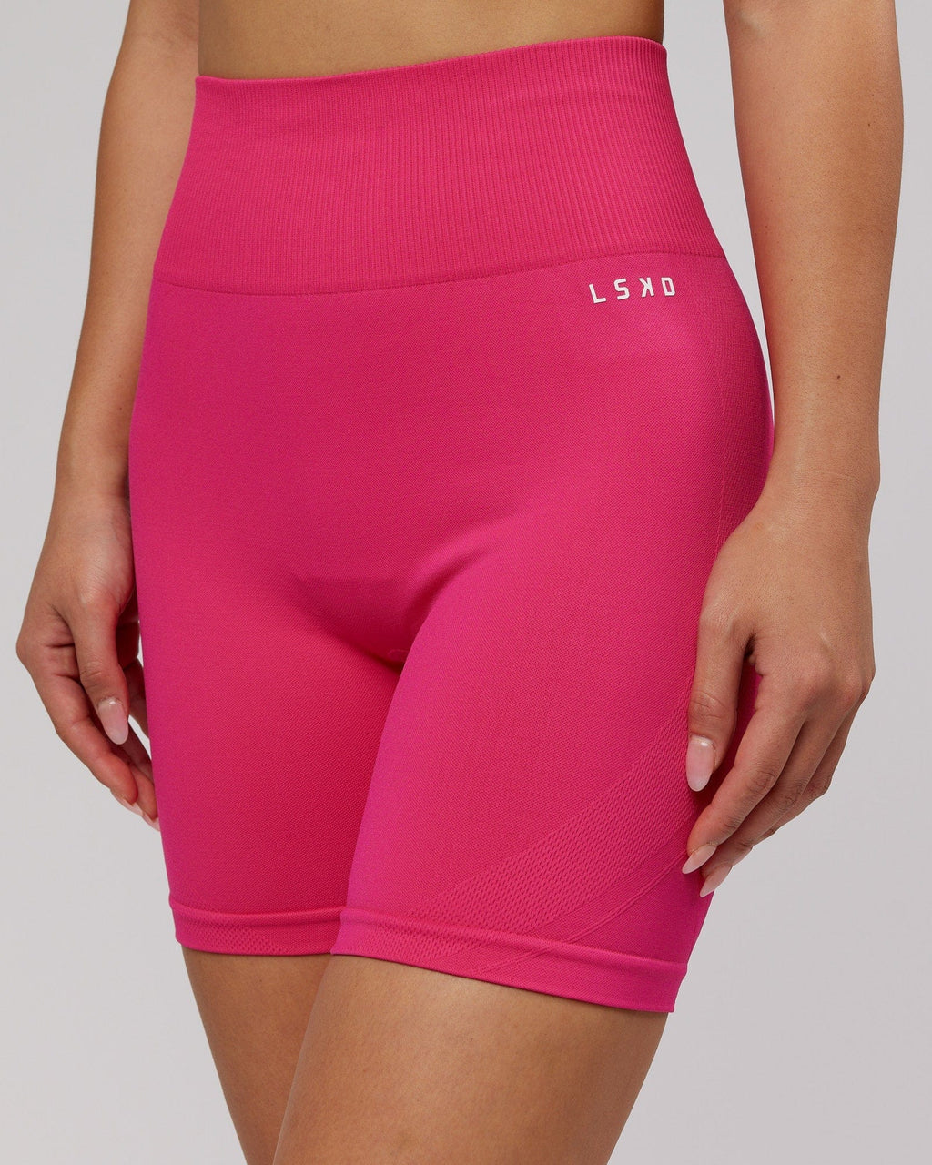 Model wearing Limitless Seamless Mid Short - Magenta