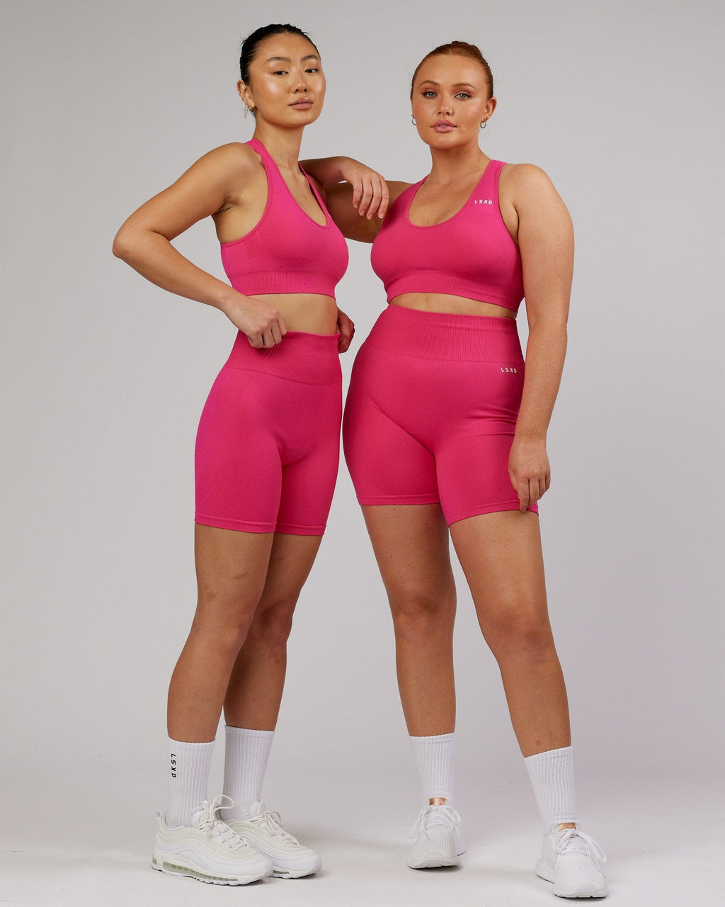Model wearing Limitless Seamless Mid Short - Magenta