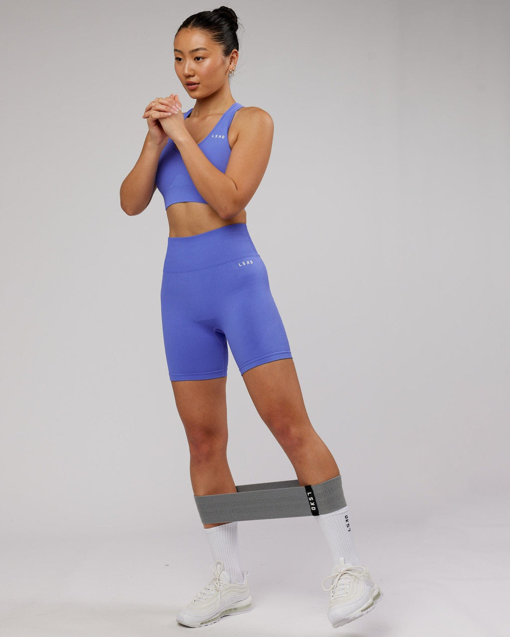 Model wearing Limitless Seamless Sports Bra - Cornflower Blue