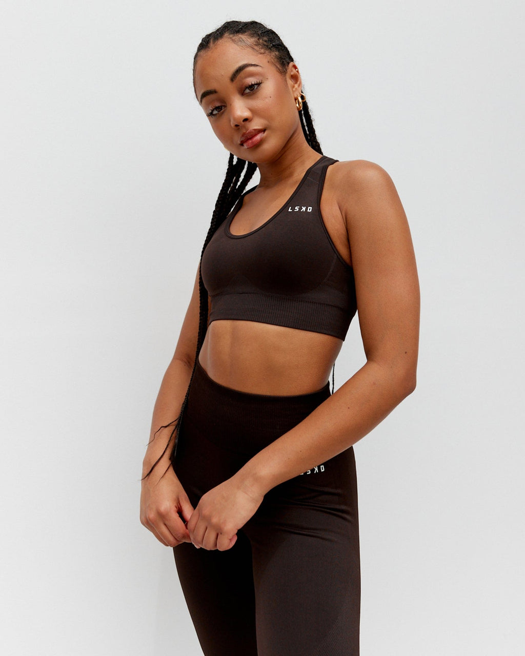 Model wearing Limitless Seamless Sports Bra - Dark Walnut