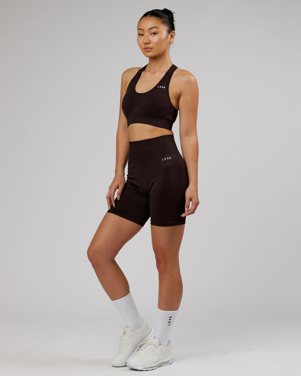 Model wearing Limitless Seamless Sports Bra - Dark Walnut