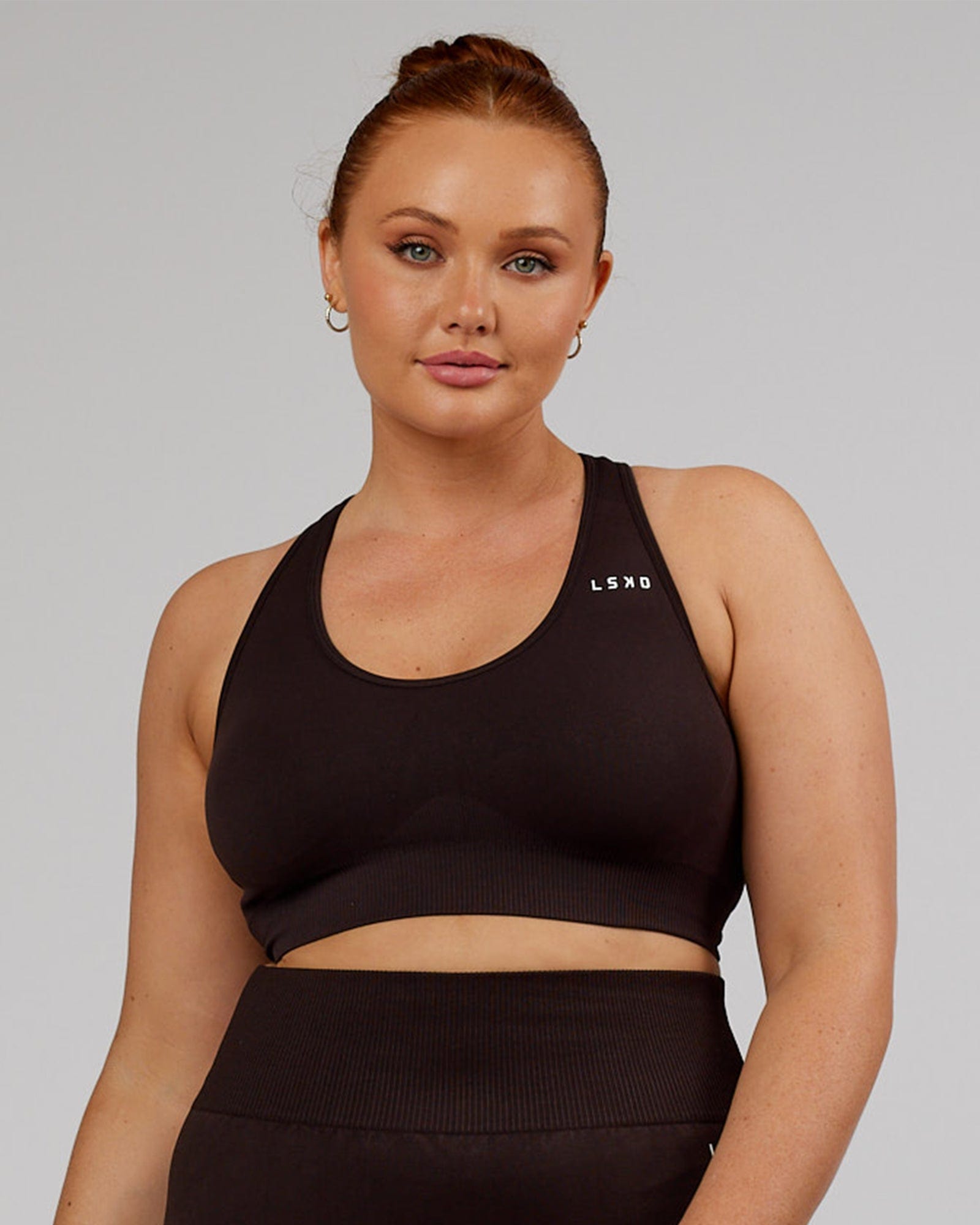 Model wearing Limitless Seamless Sports Bra - Dark Walnut