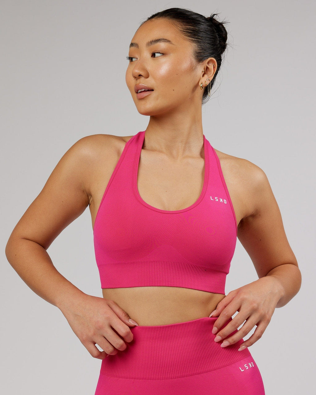 Model wearing Limitless Seamless Sports Bra - Magenta