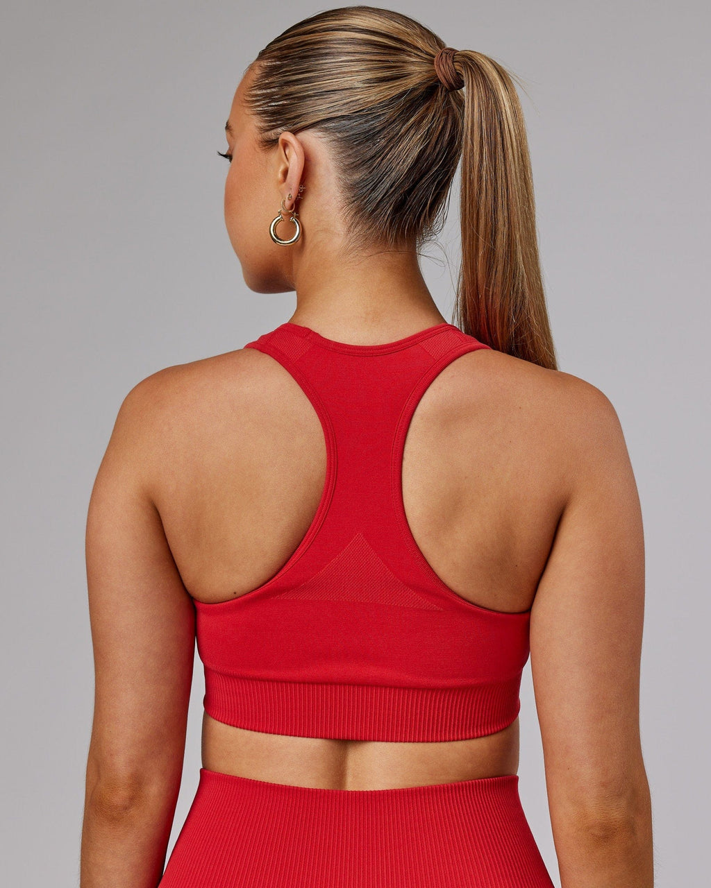 Model wearing Limitless Seamless Sports Bra - Scarlet