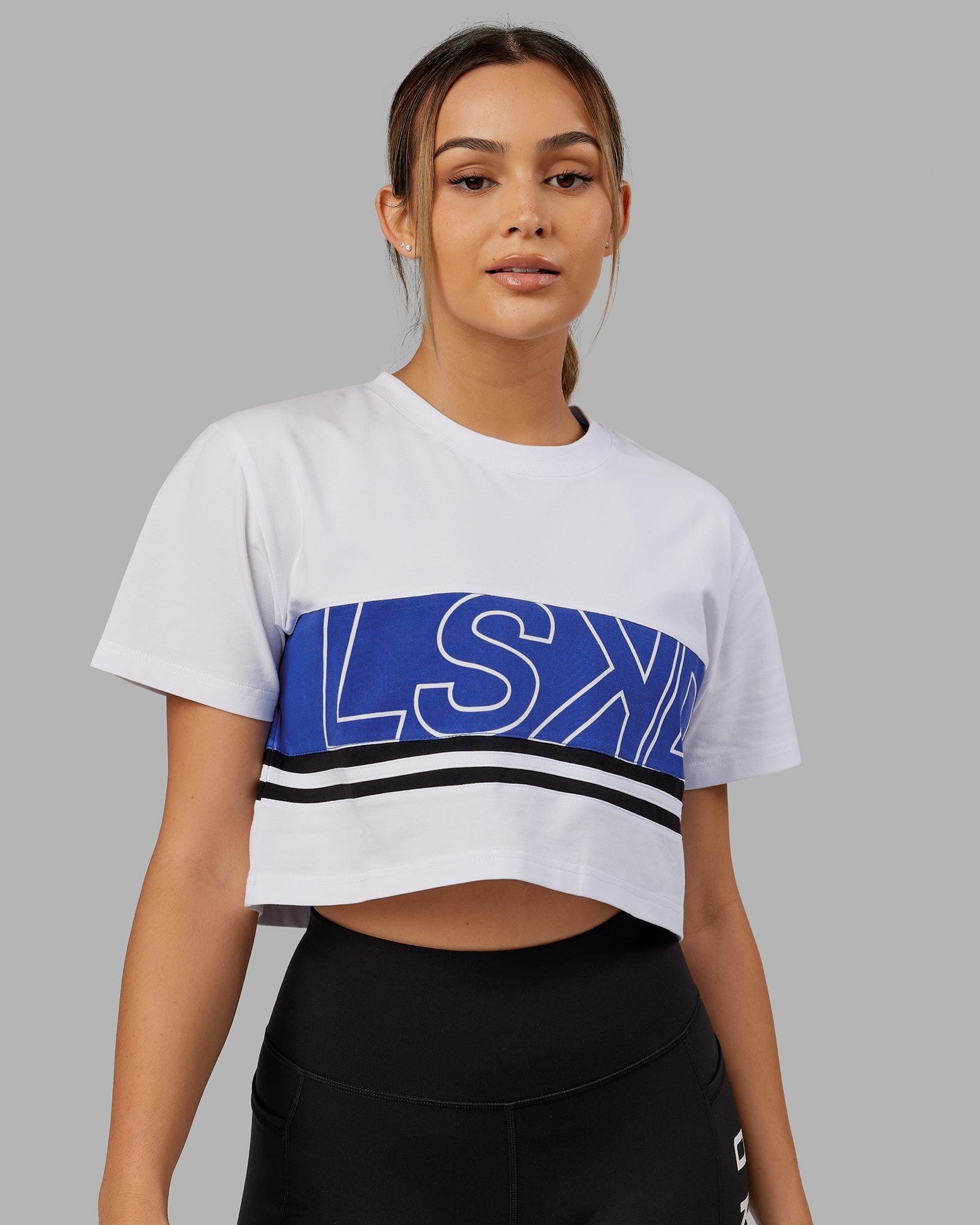 Model wearing Line-Up Cropped Tee - White-Power Cobalt