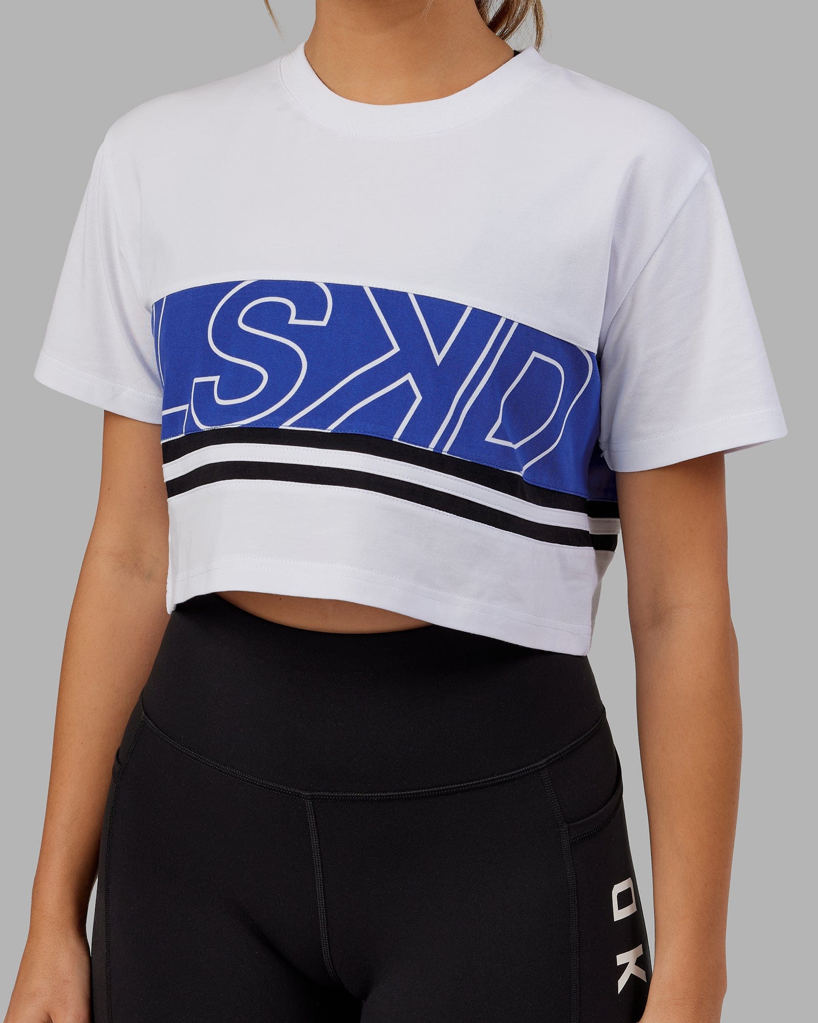 Model wearing Line-Up Cropped Tee - White-Power Cobalt