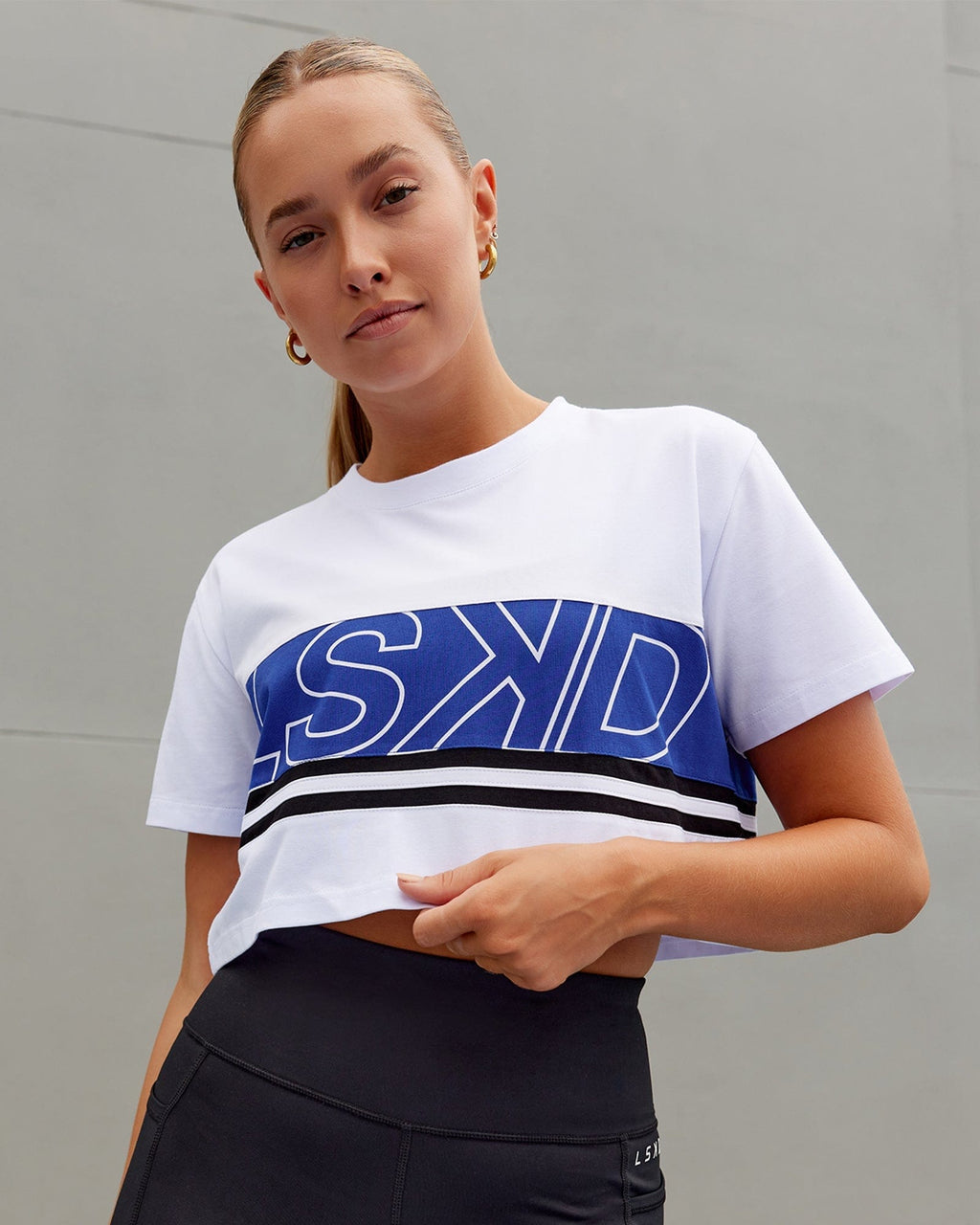 Model wearing Line-Up Cropped Tee - White-Power Cobalt