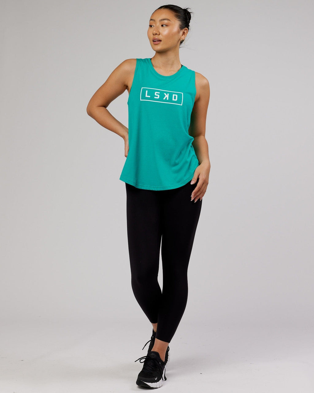 Model wearing Luna Tank - Hyper Teal