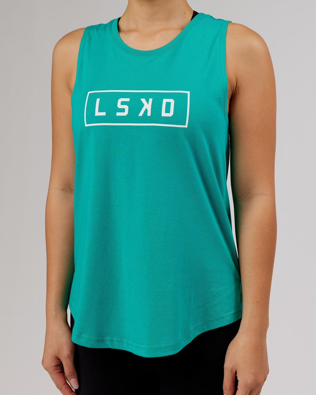 Model wearing Luna Tank - Hyper Teal