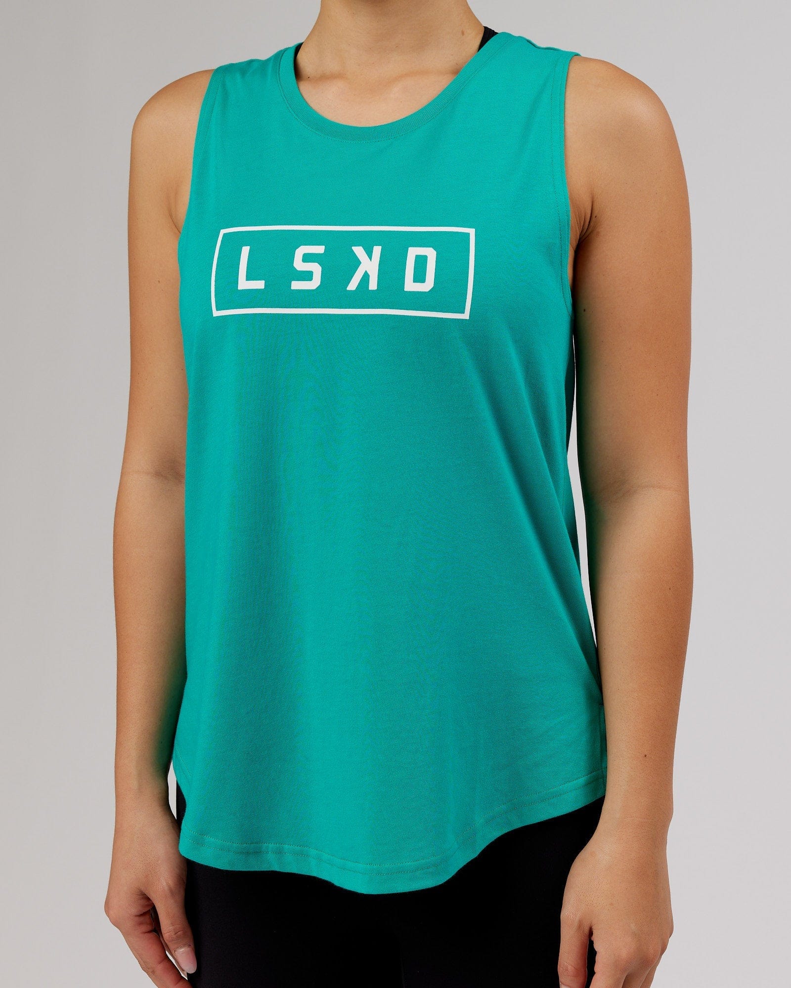 Model wearing Luna Tank - Hyper Teal