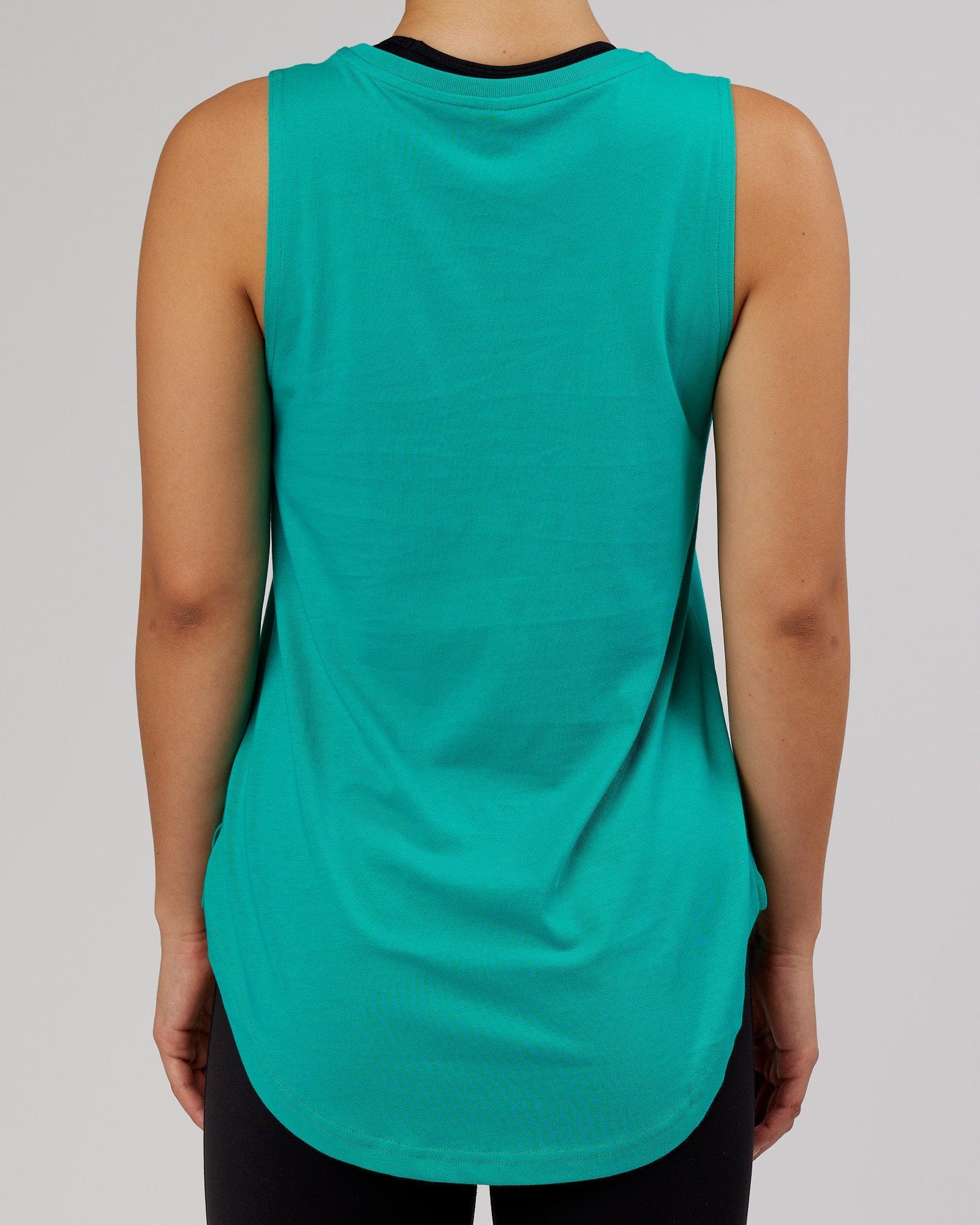 Model wearing Luna Tank - Hyper Teal