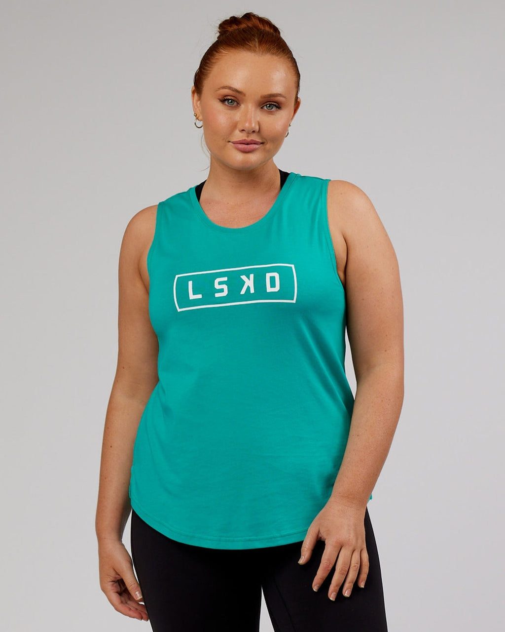 Model wearing Luna Tank - Hyper Teal