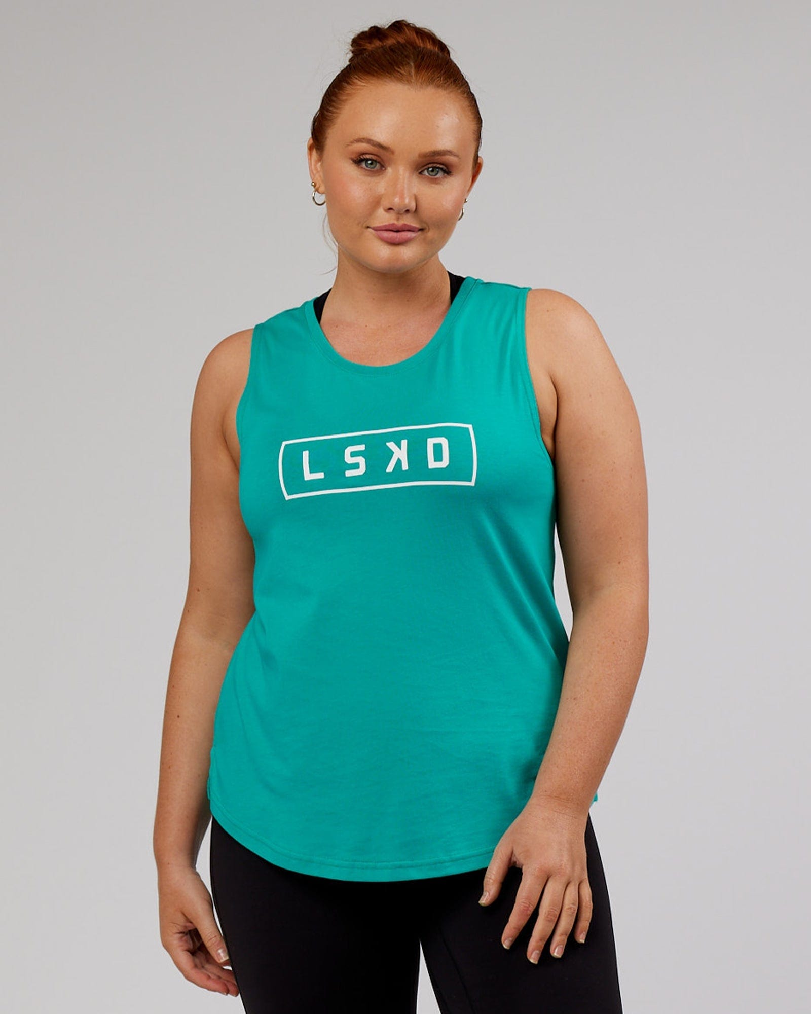 Model wearing Luna Tank - Hyper Teal