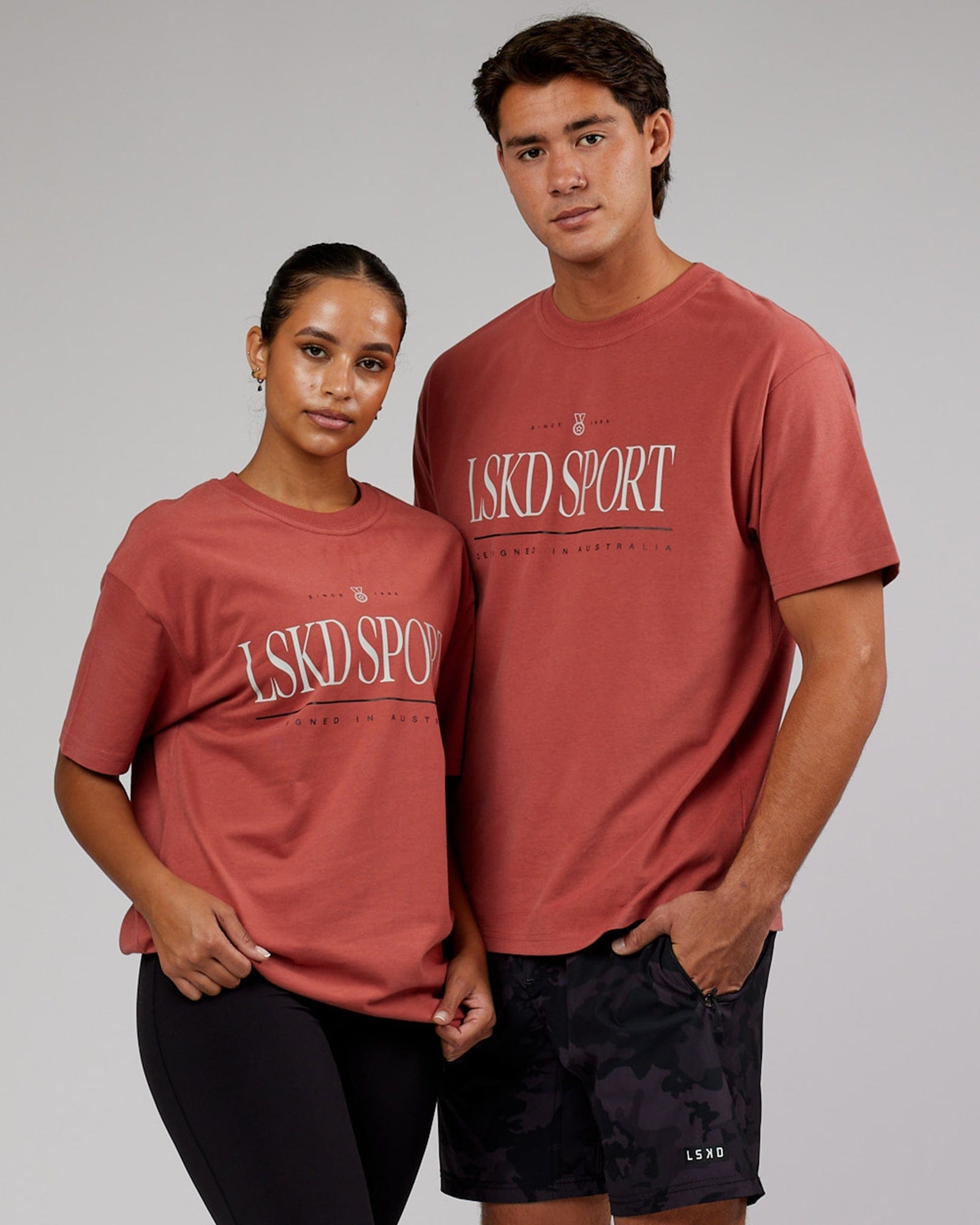 Model wearing Unisex Heritage Heavyweight Tee Oversize - Marsala