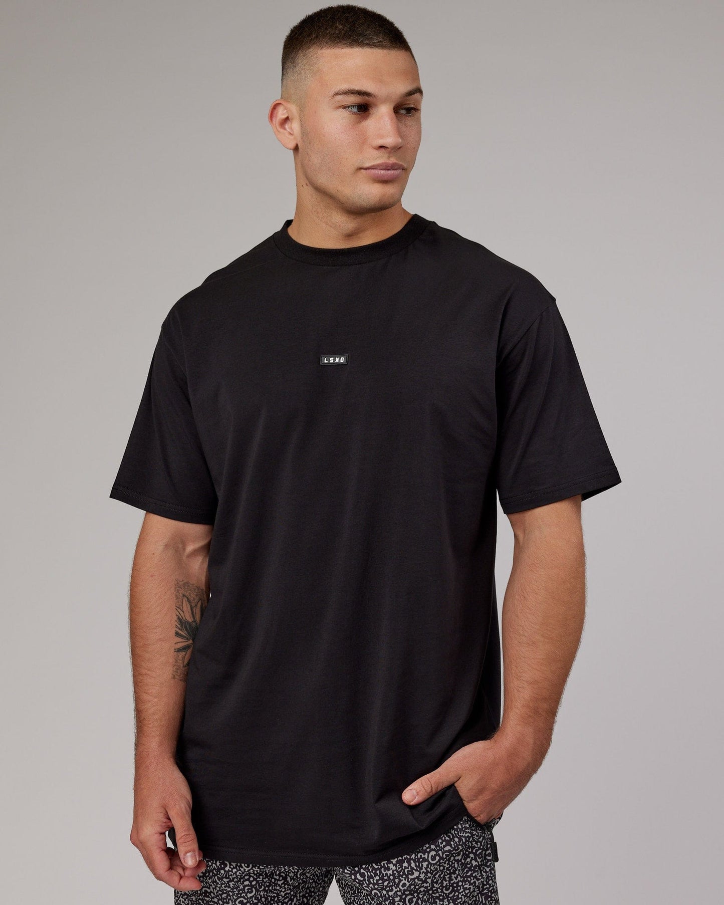 Model wearing Fundamental FLXCotton Tee Longline Oversize - Black