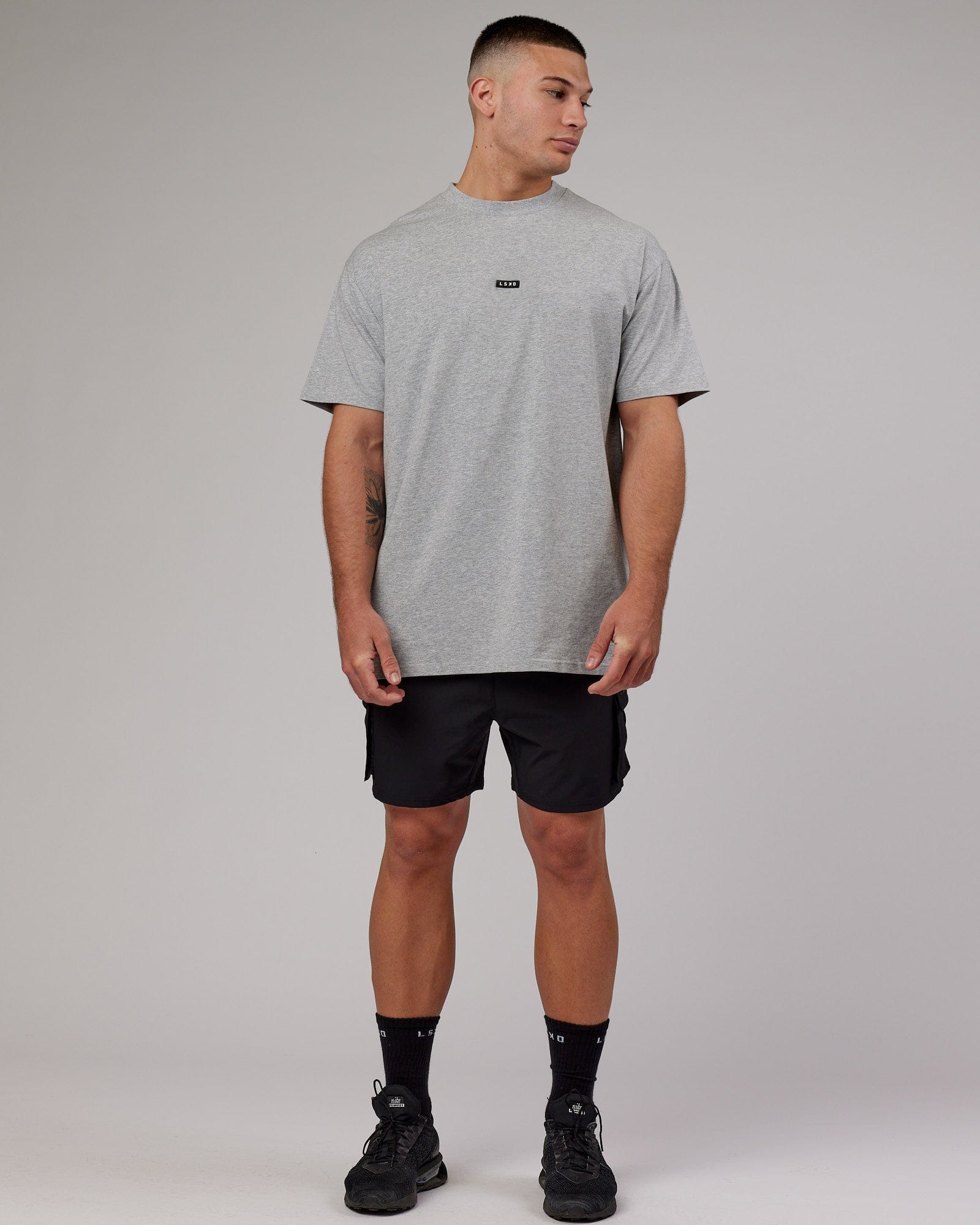 Model wearing Fundamental FLXCotton Tee Longline Oversize - Light Grey Marl