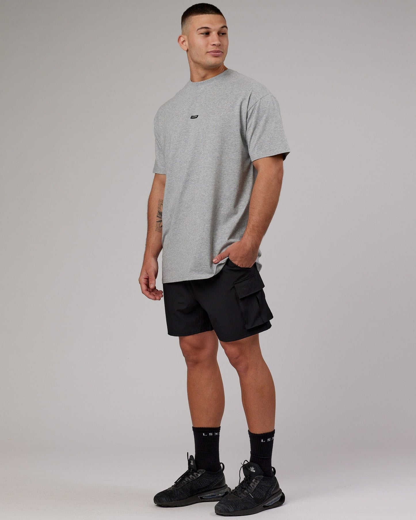 Model wearing Fundamental FLXCotton Tee Longline Oversize - Light Grey Marl