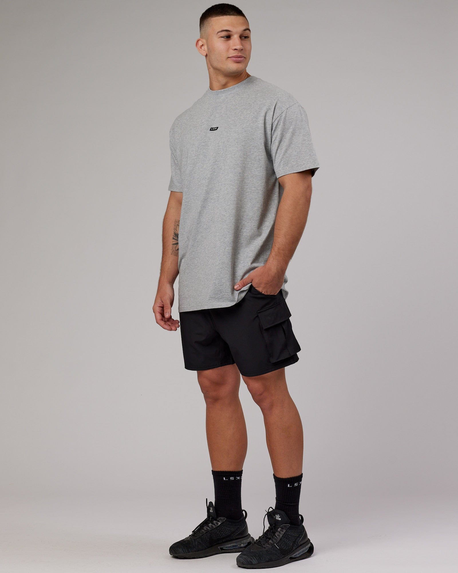 Model wearing Fundamental FLXCotton Tee Longline Oversize - Light Grey Marl