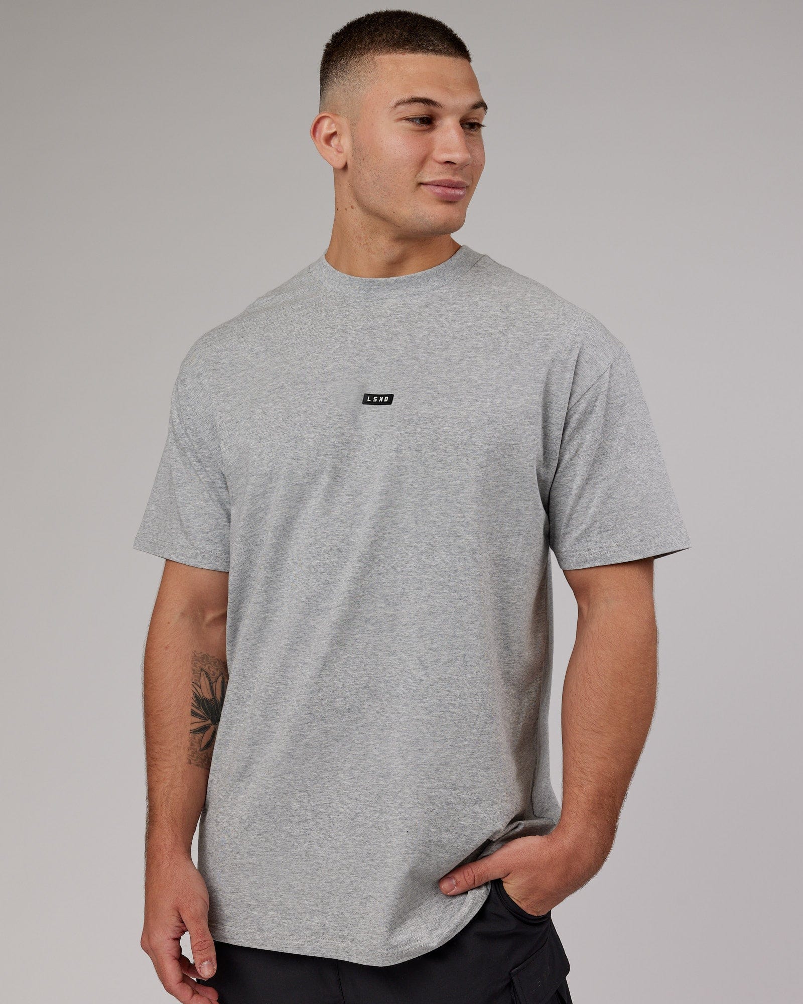 Model wearing Fundamental FLXCotton Tee Longline Oversize - Light Grey Marl